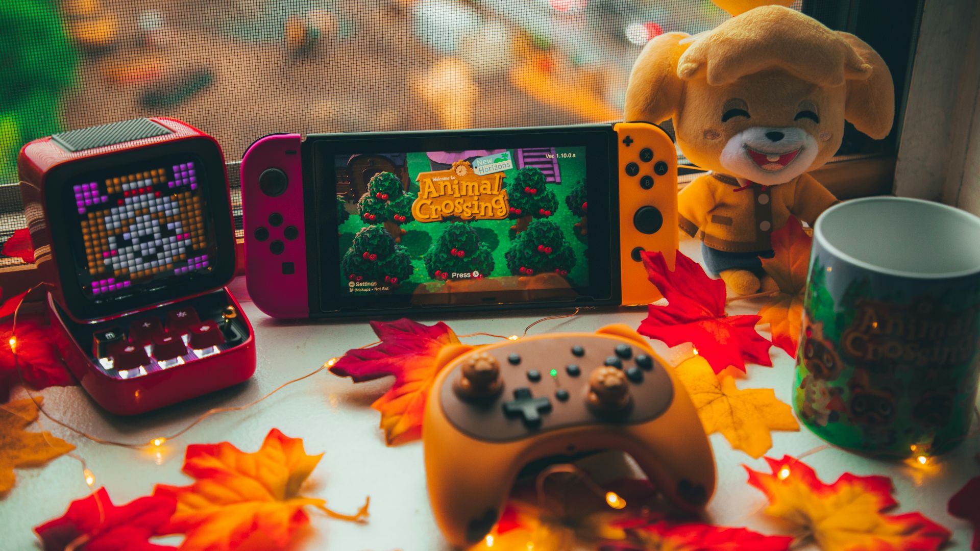 a mobile phone and a box of candy on a table