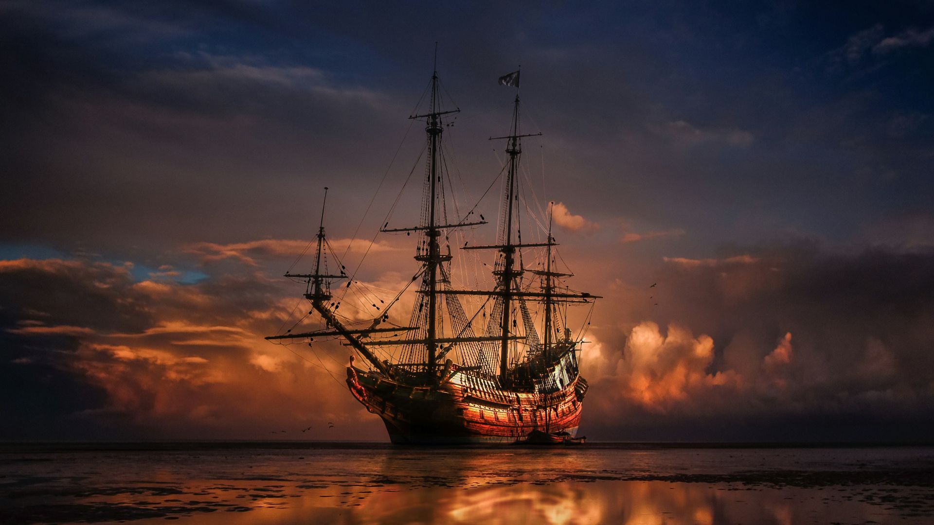 brown ship on sea during sunset