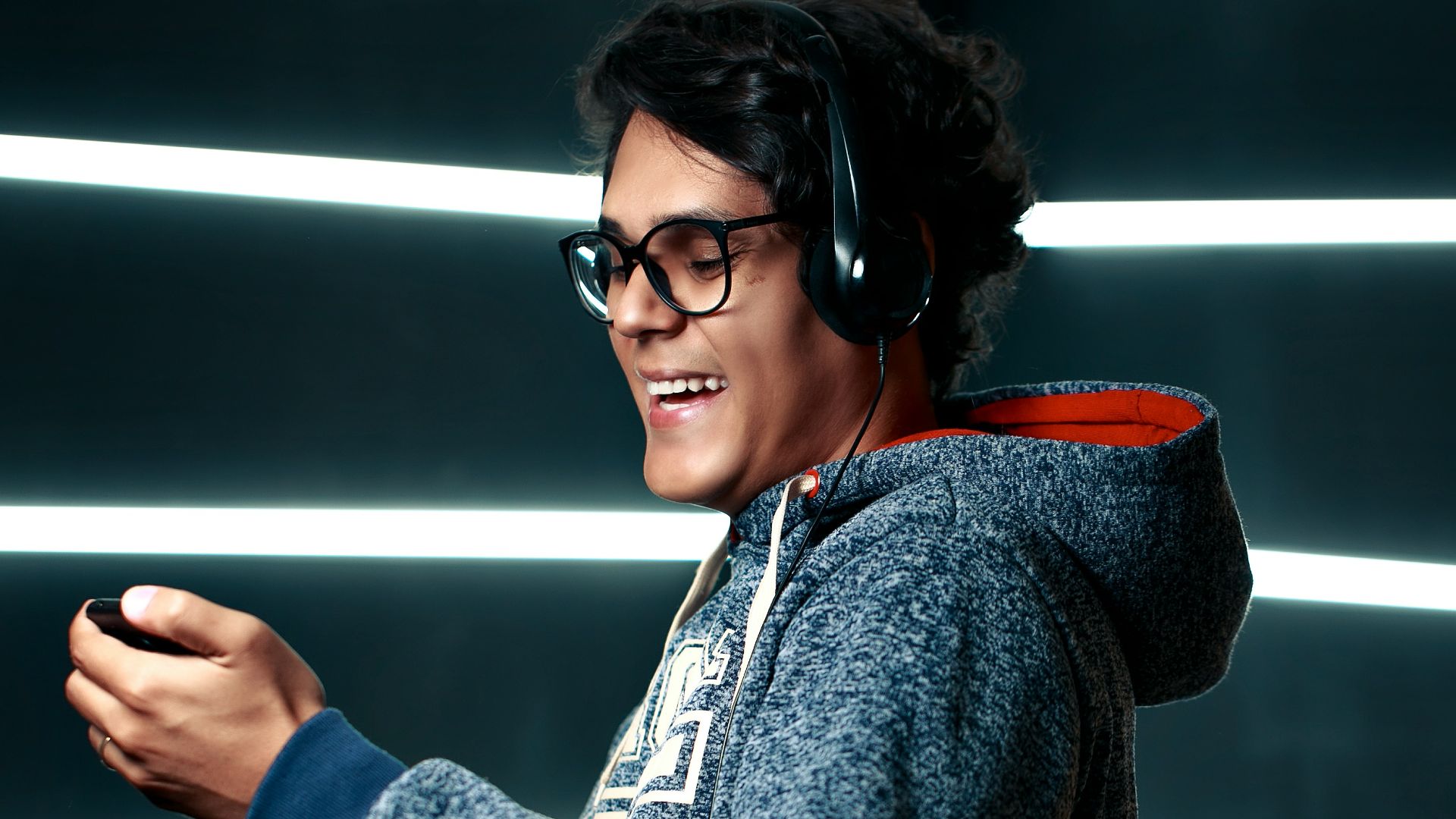 woman in black sweater wearing black framed eyeglasses