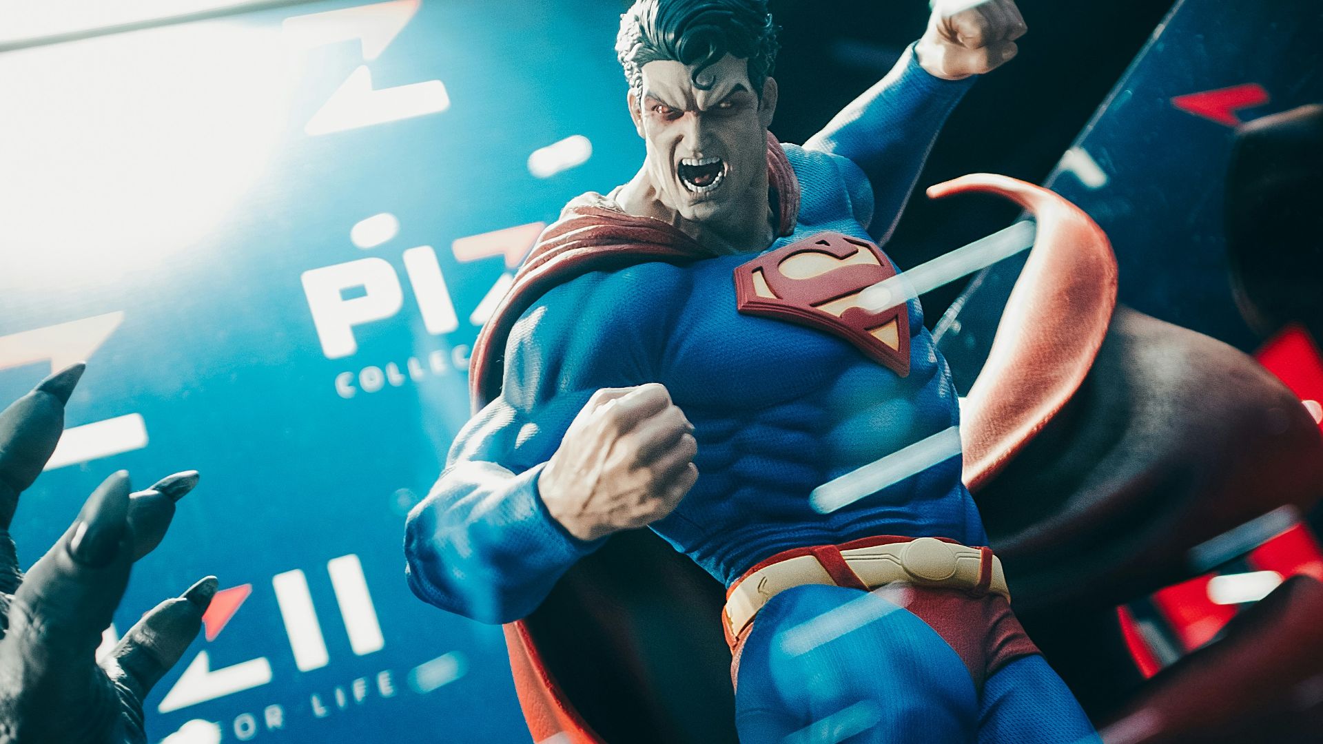 a statue of a man in a superman suit