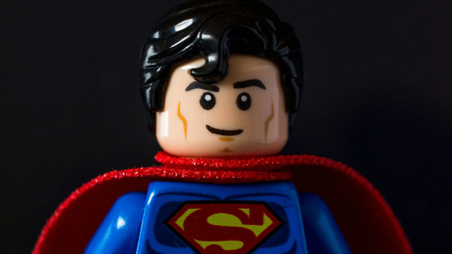 lego mini figure on red chair