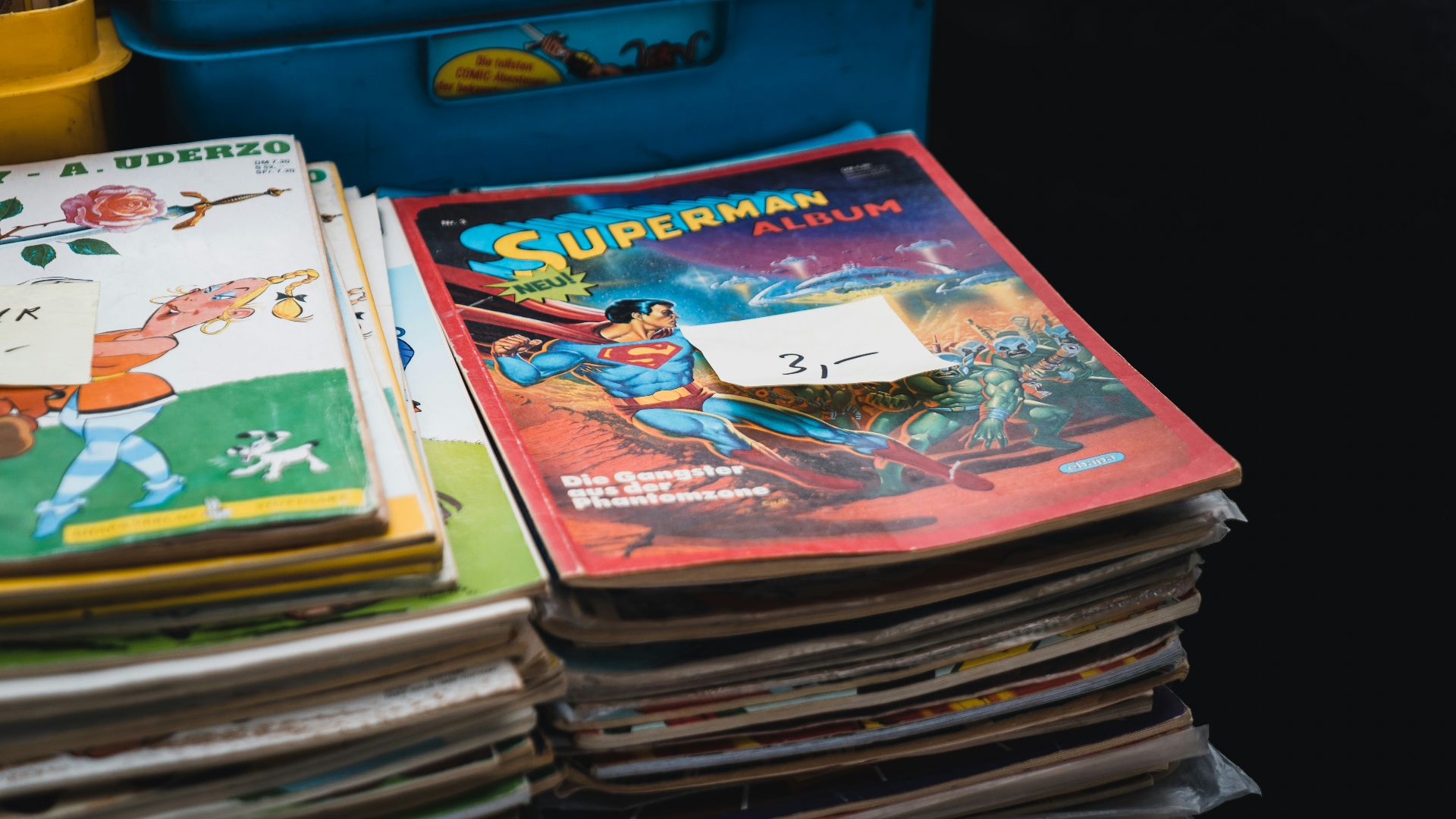a stack of children's books sitting on top of a table