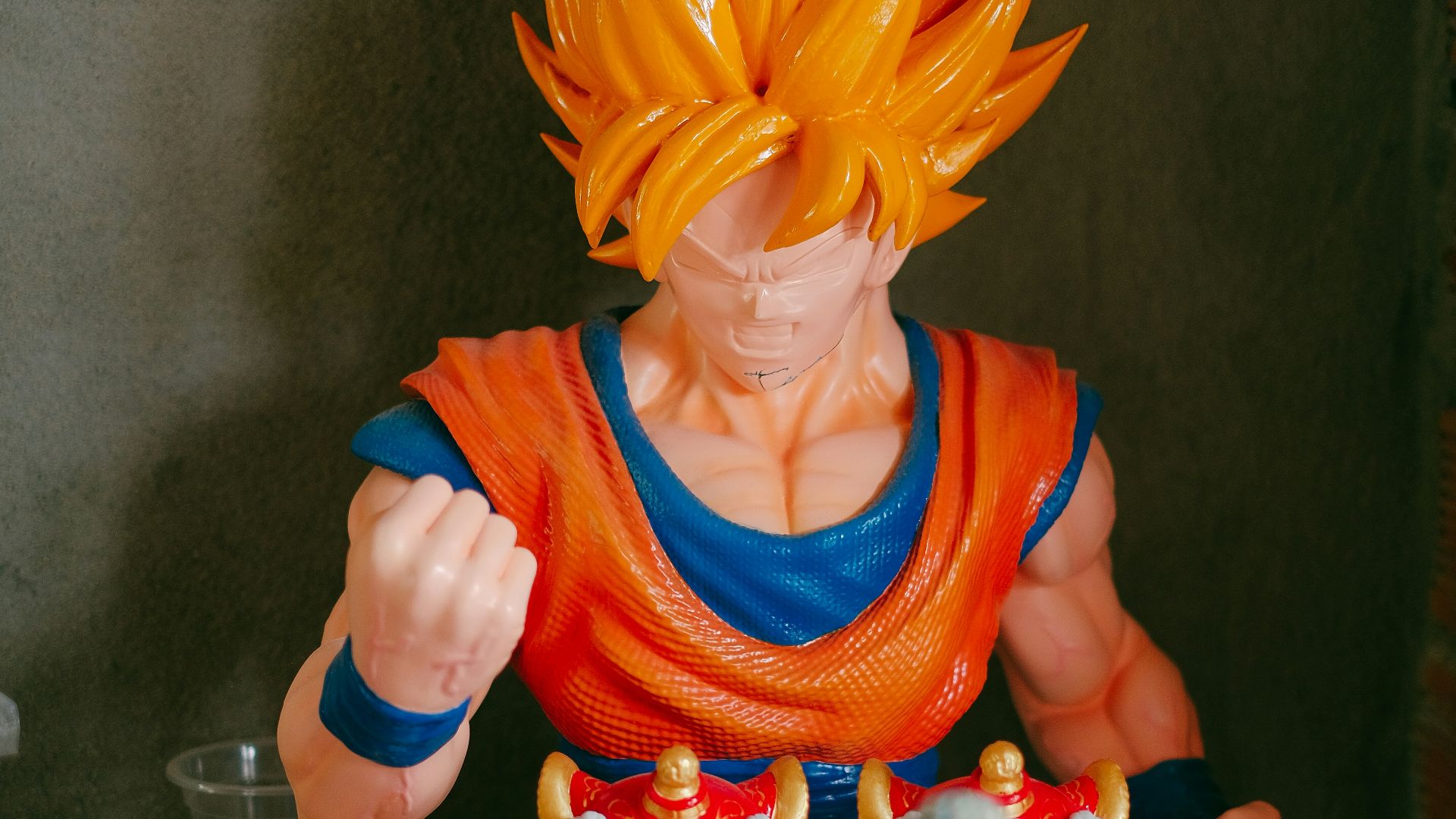 a dragon figurine sitting on top of a table