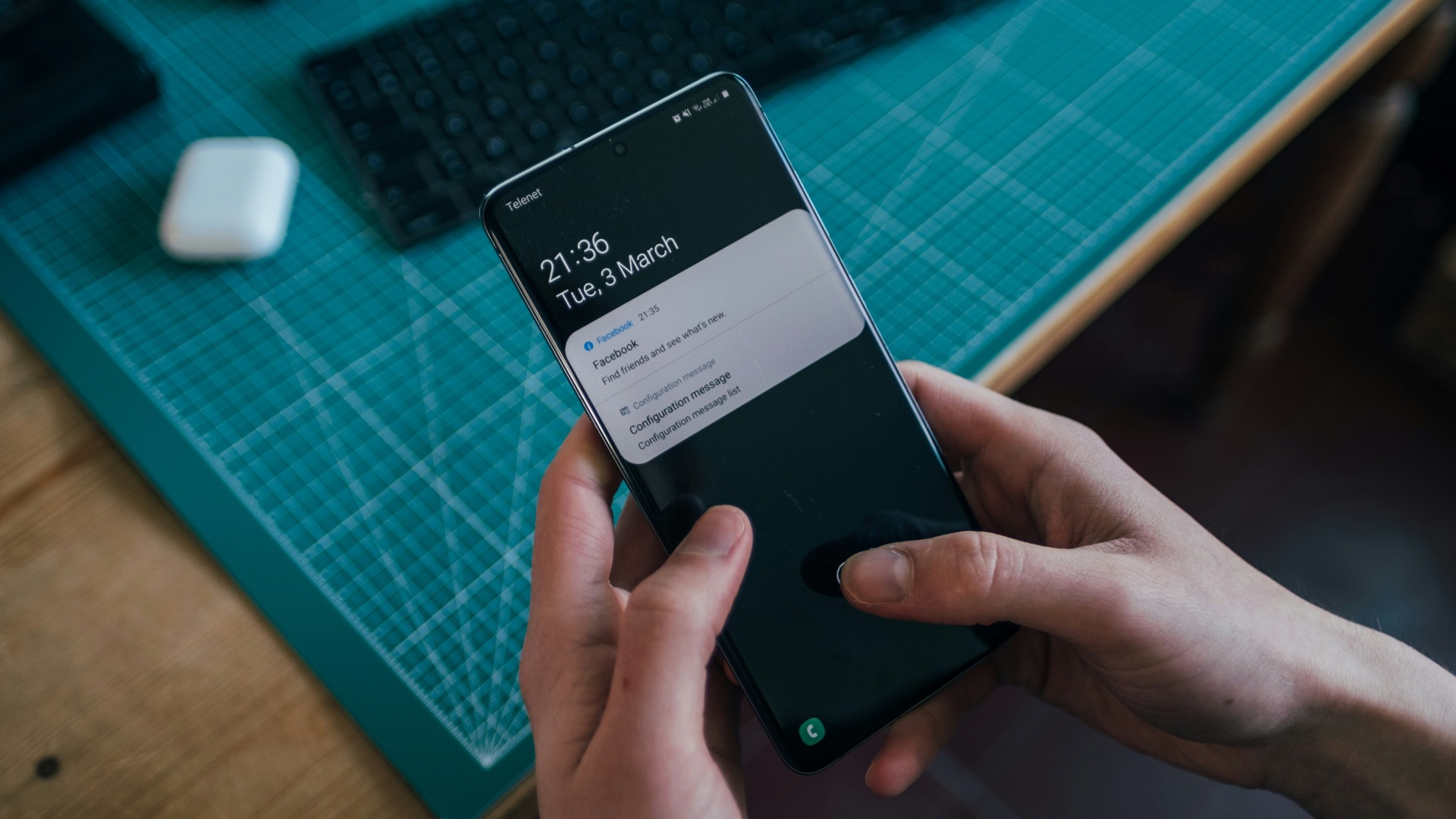 person holding black android smartphone