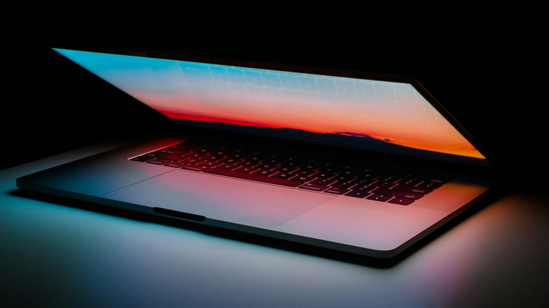 gray and black laptop computer on surface