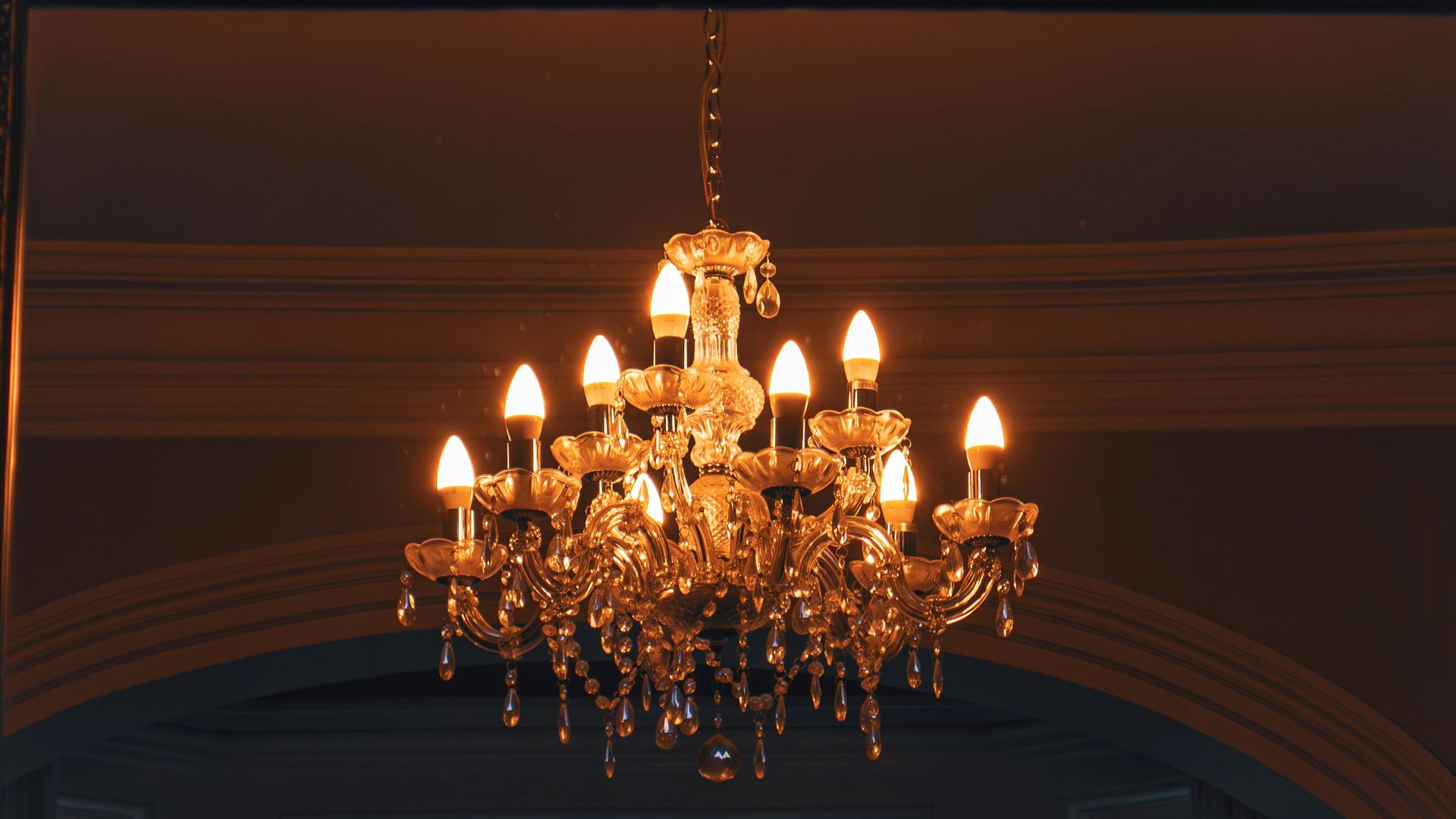 a chandelier hanging from the ceiling of a room