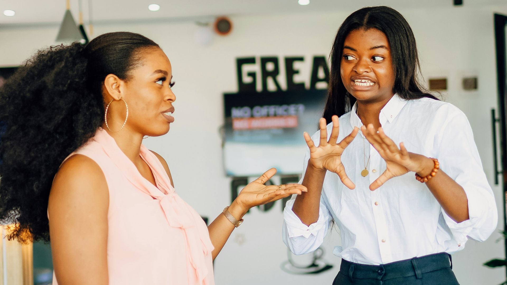A couple of women standing next to each other