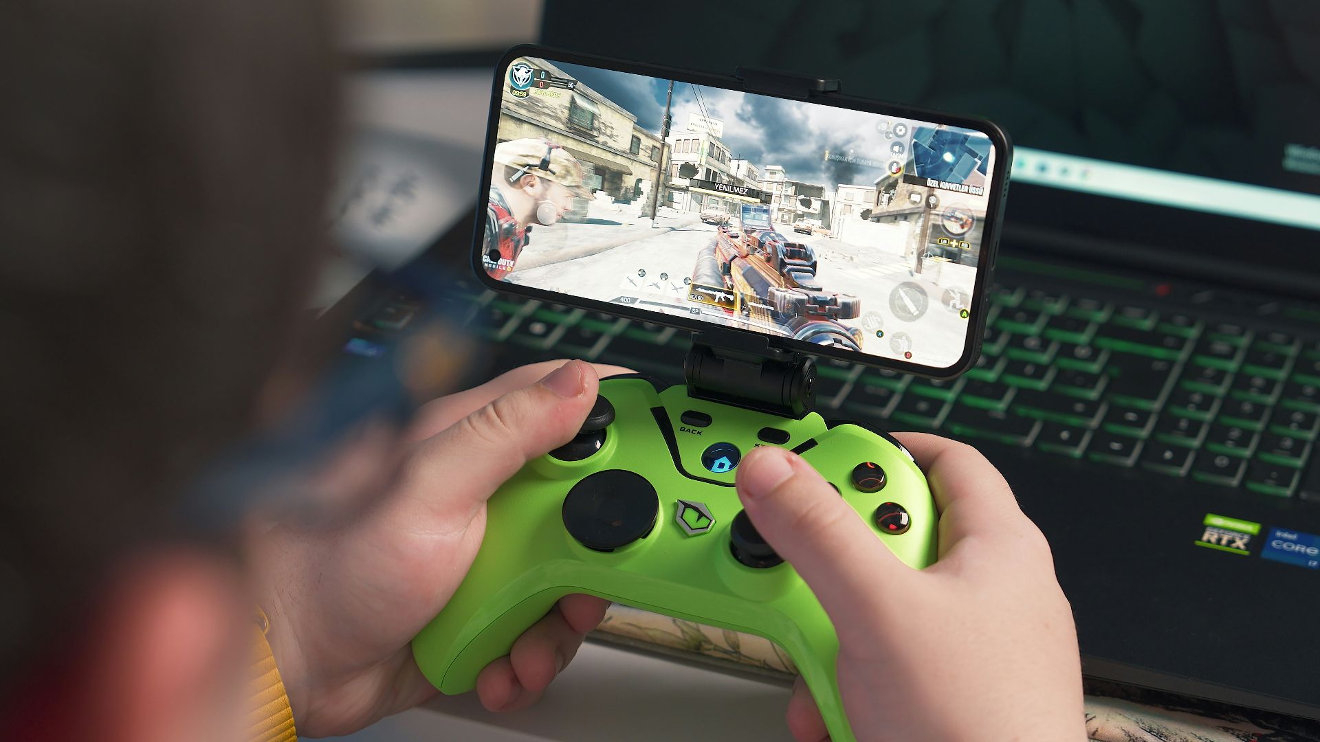 a person playing a video game on a laptop