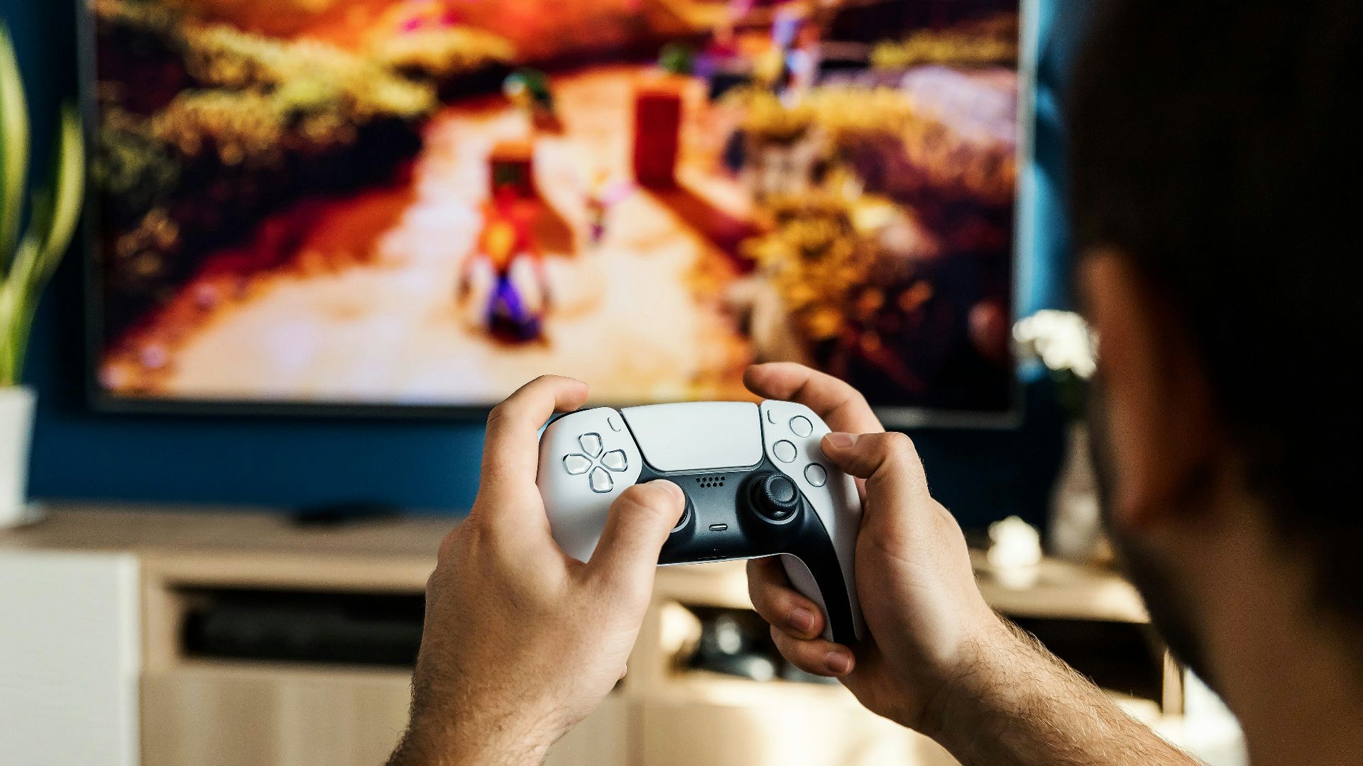 a man playing a video game on the nintendo wii