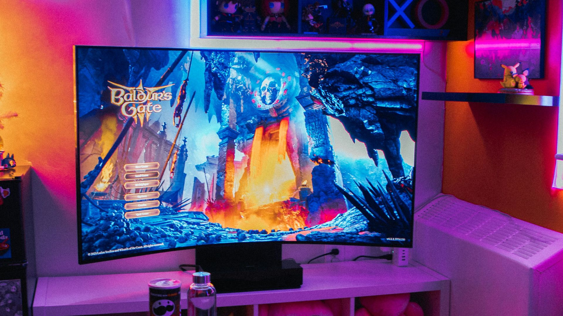 a living room with a television and a game system