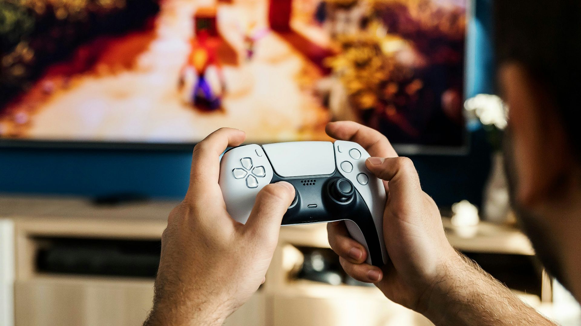 a man playing a video game on the nintendo wii