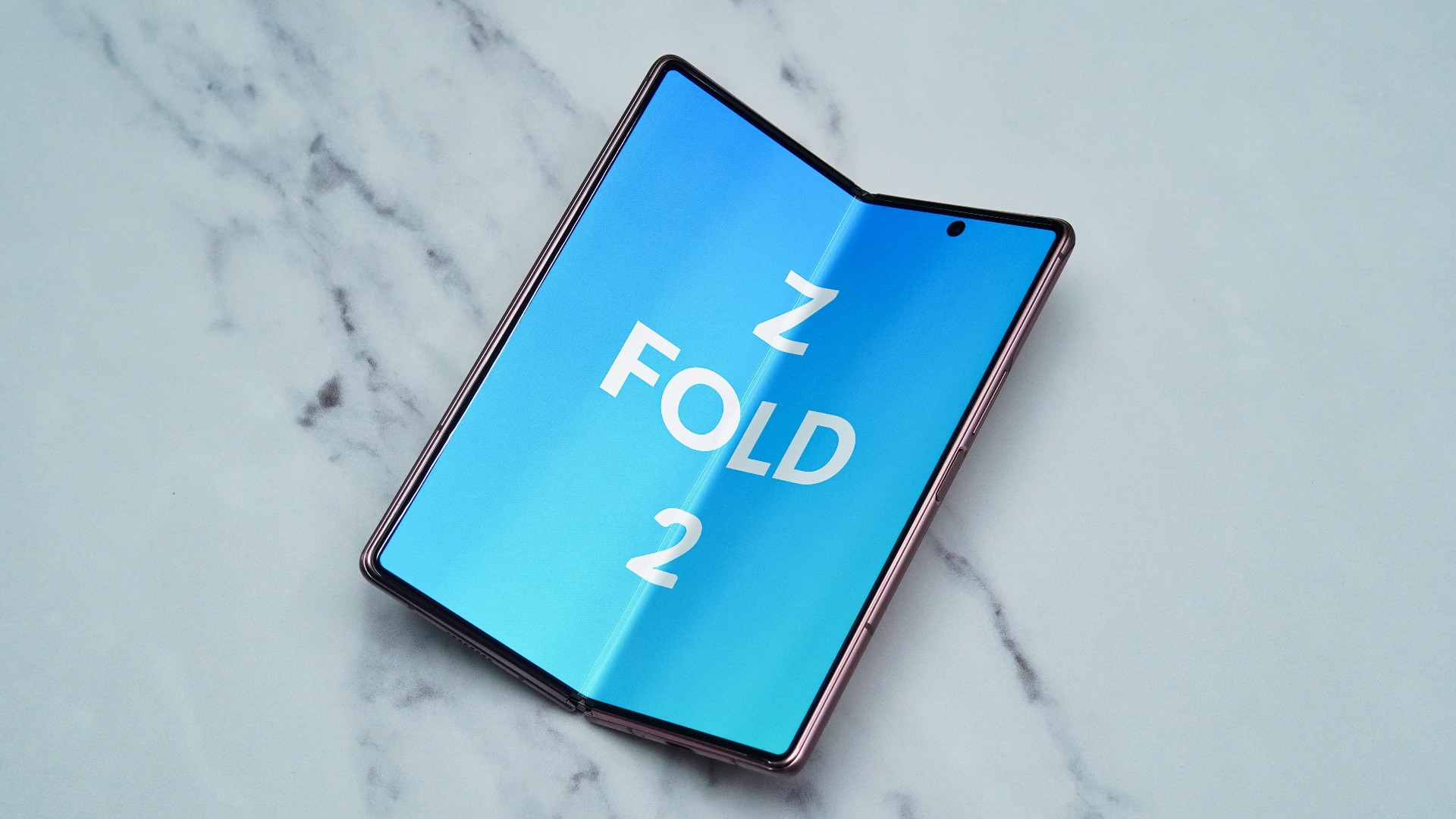 a blue sign on a white surface