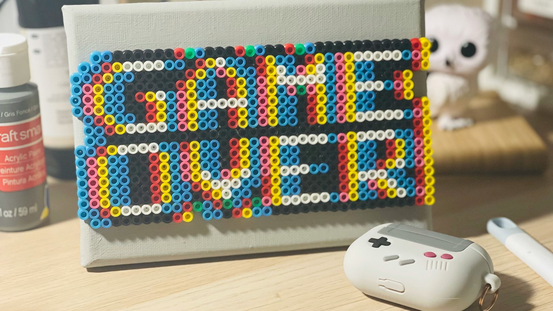 a nintendo wii game controller sitting on top of a table