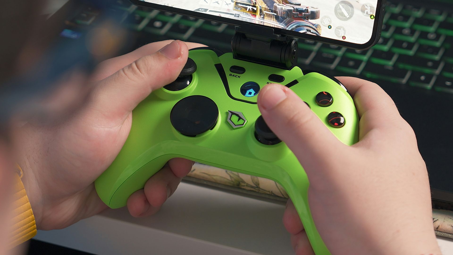 a person playing a video game on a laptop