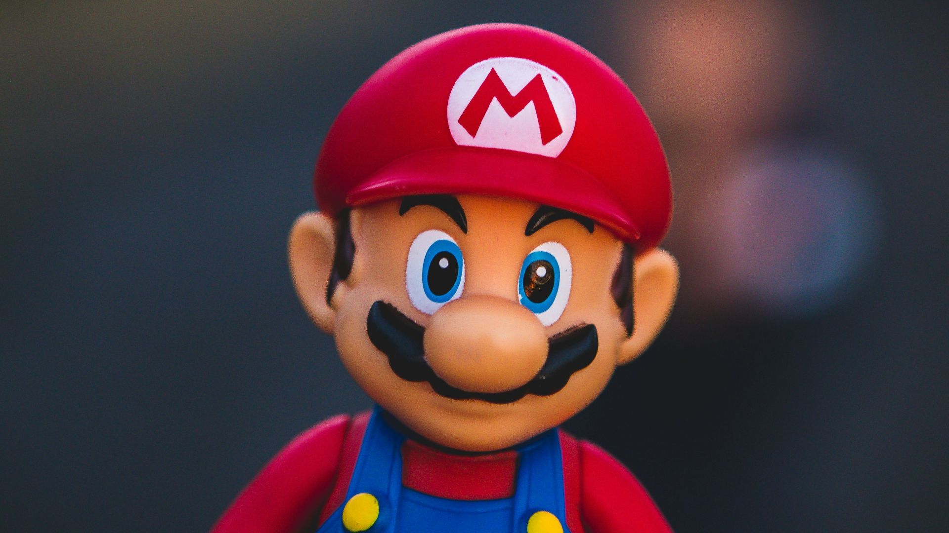 super mario in blue and red shirt figurine