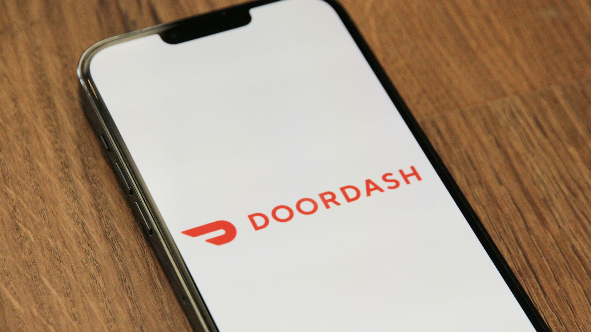 a close up of a cell phone on a table