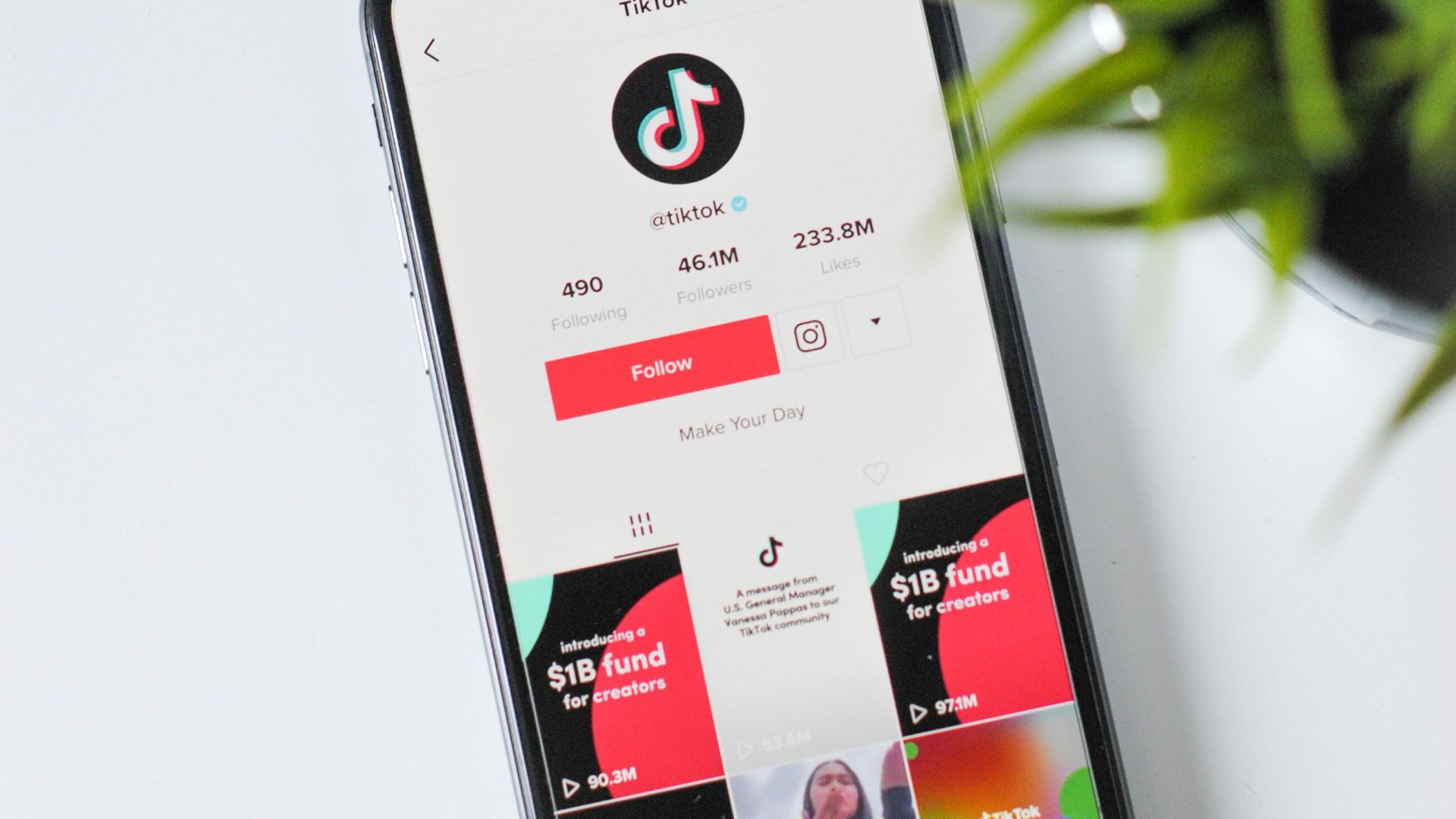 iphone xs on white table