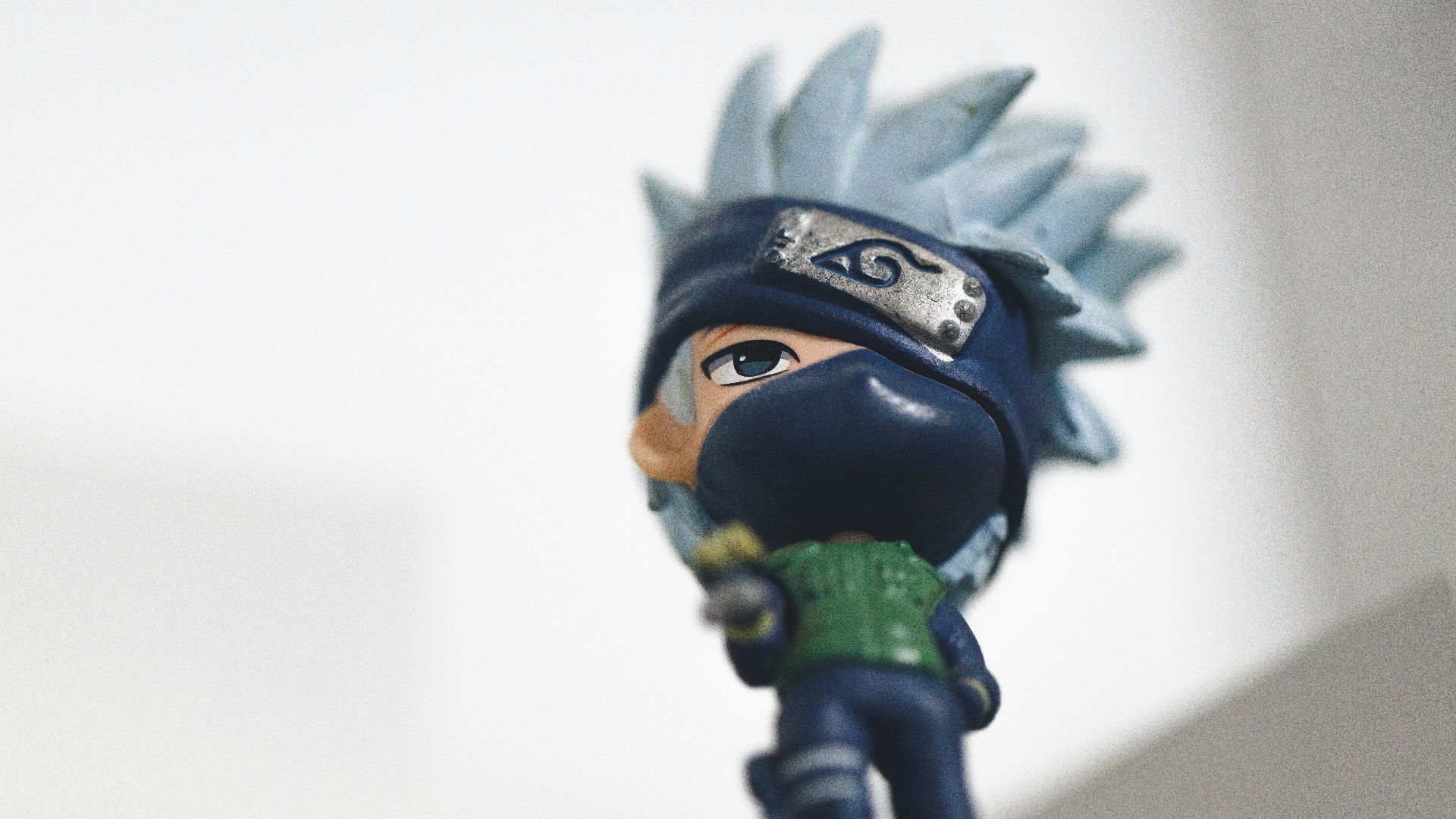 a figurine of a person with a hat on