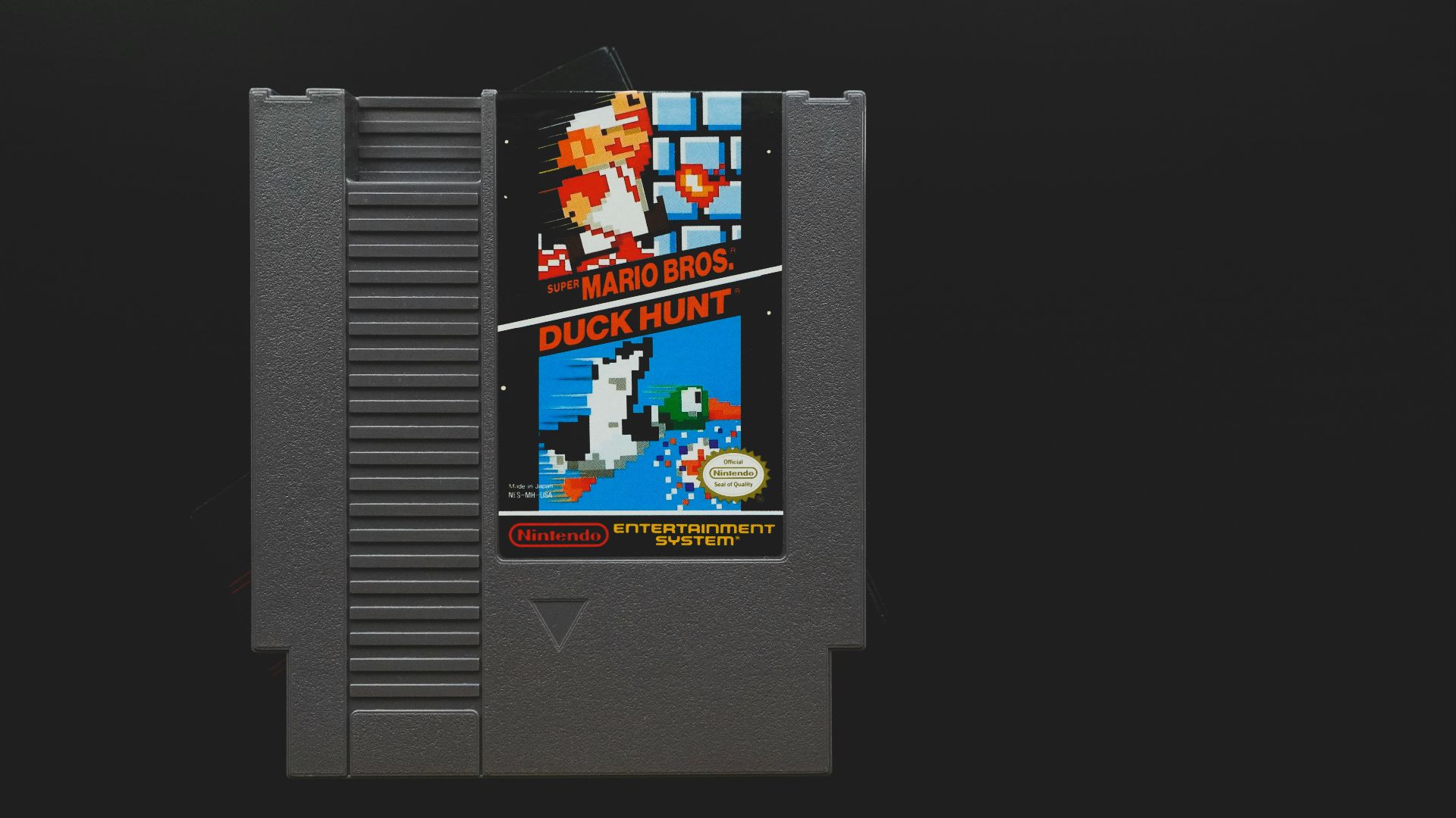 nintendo game boy cartridge on black surface