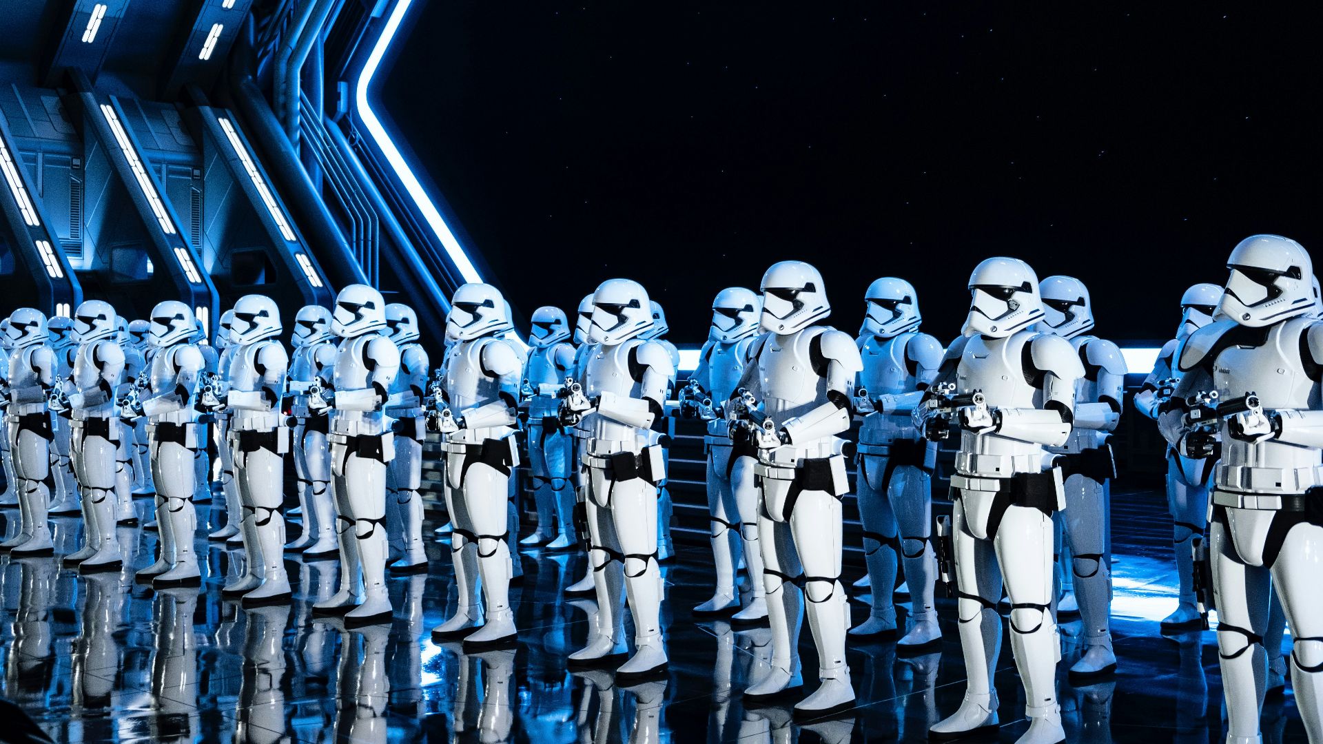 white robot toy on black background