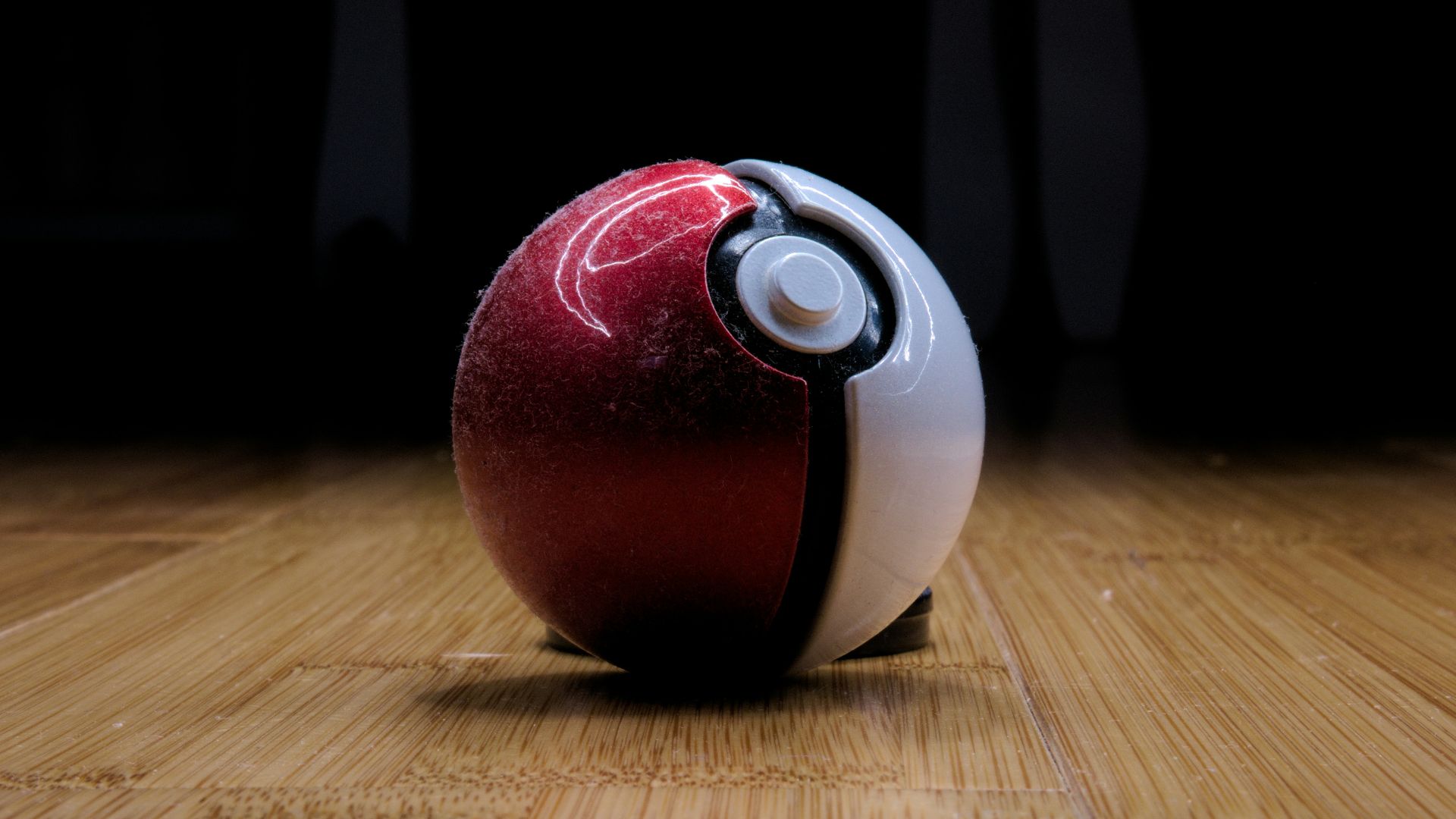 red and white round plastic toy