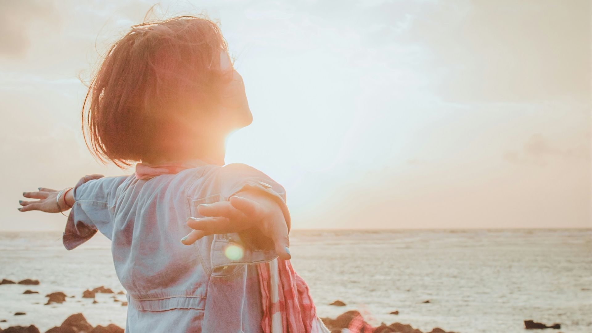 woman spreading her arms