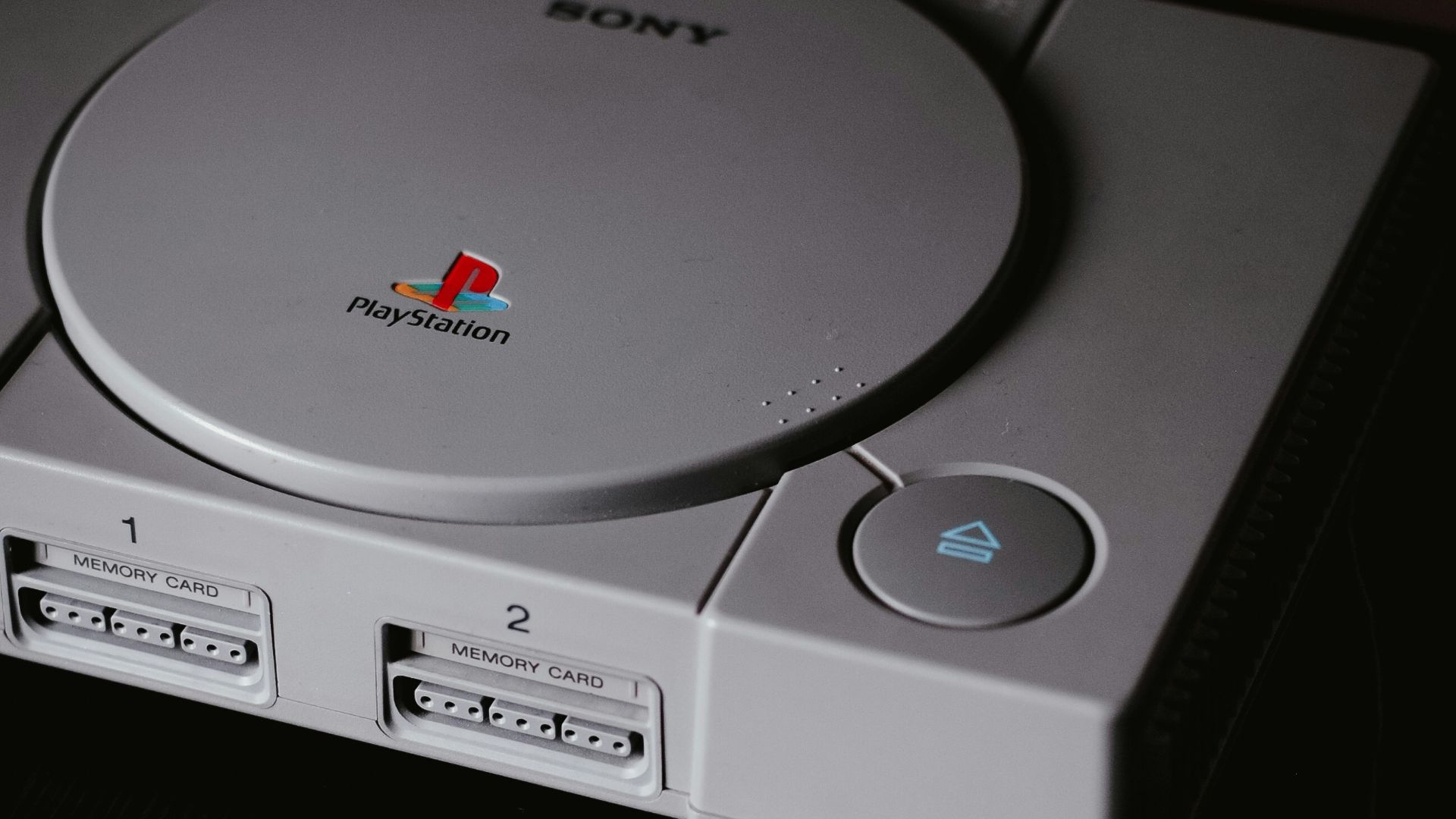 photo of closed Sony PS1 with DualShock 1