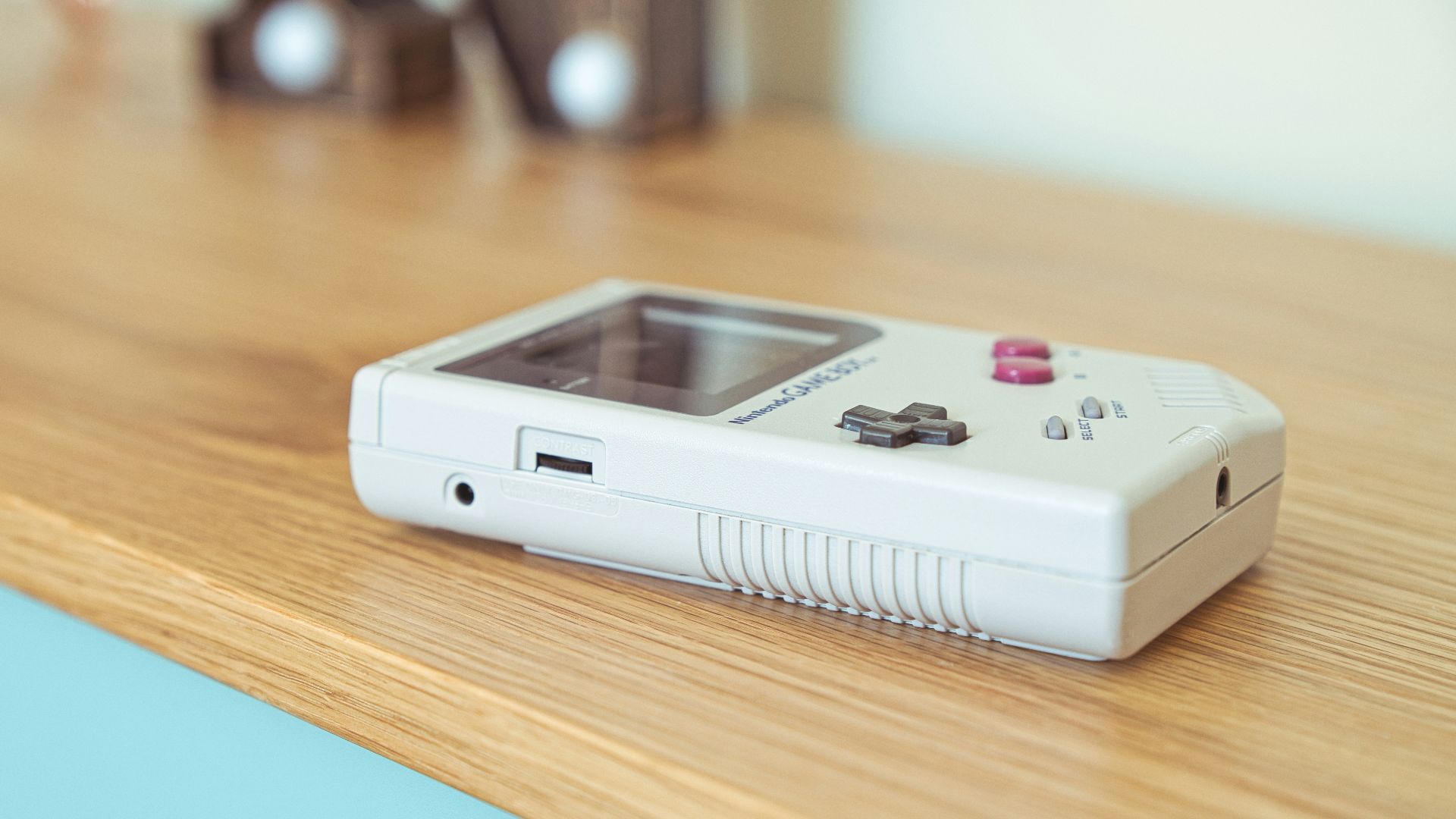 white iphone 4 on white electronic device