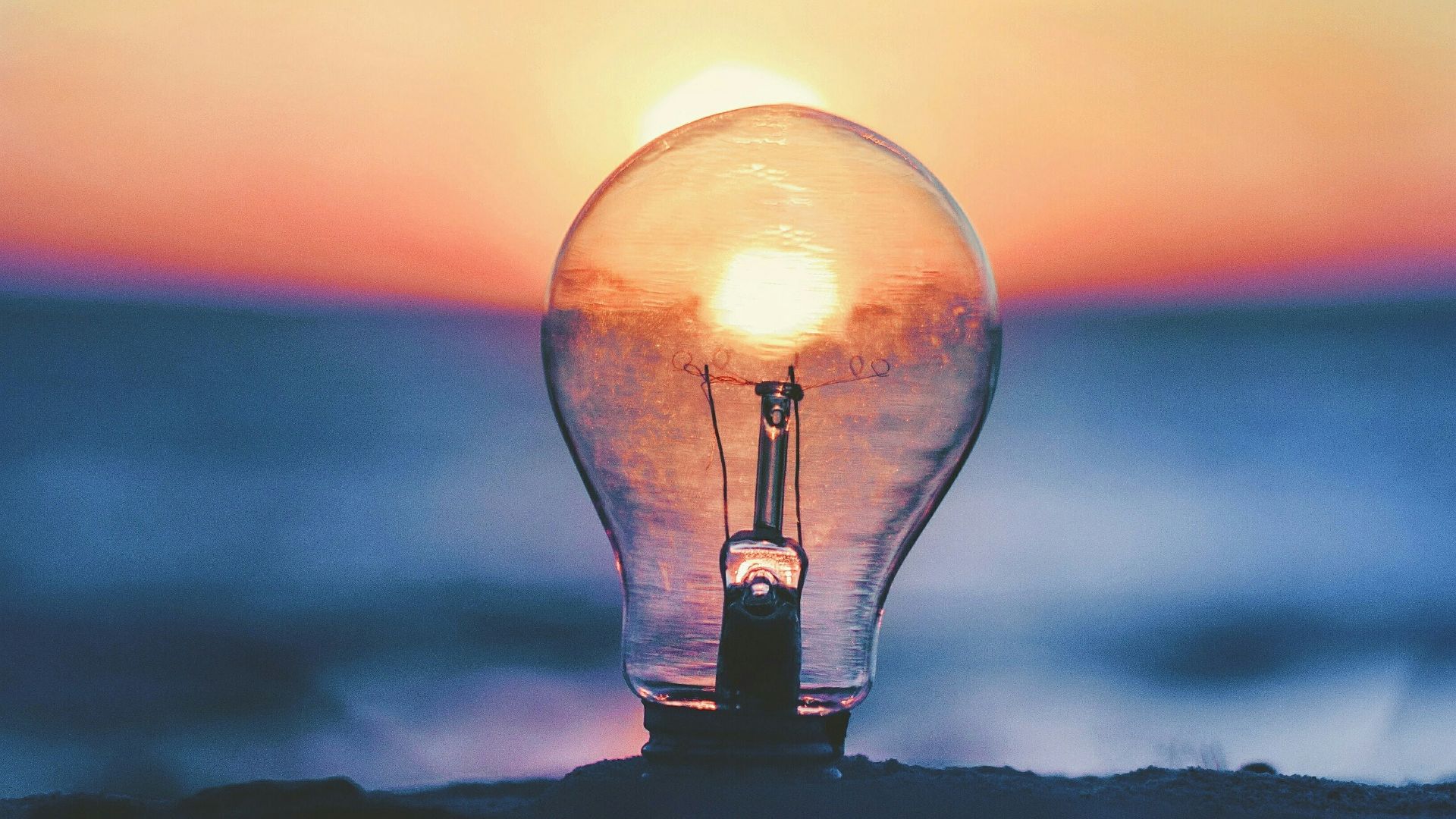 selective focus photography of light bulb