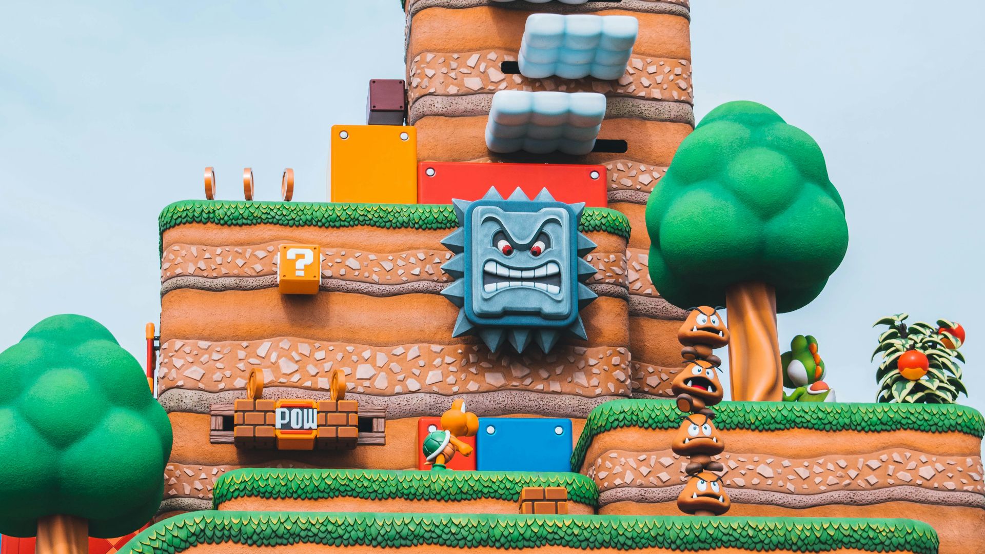 blue green and brown concrete building under blue sky during daytime