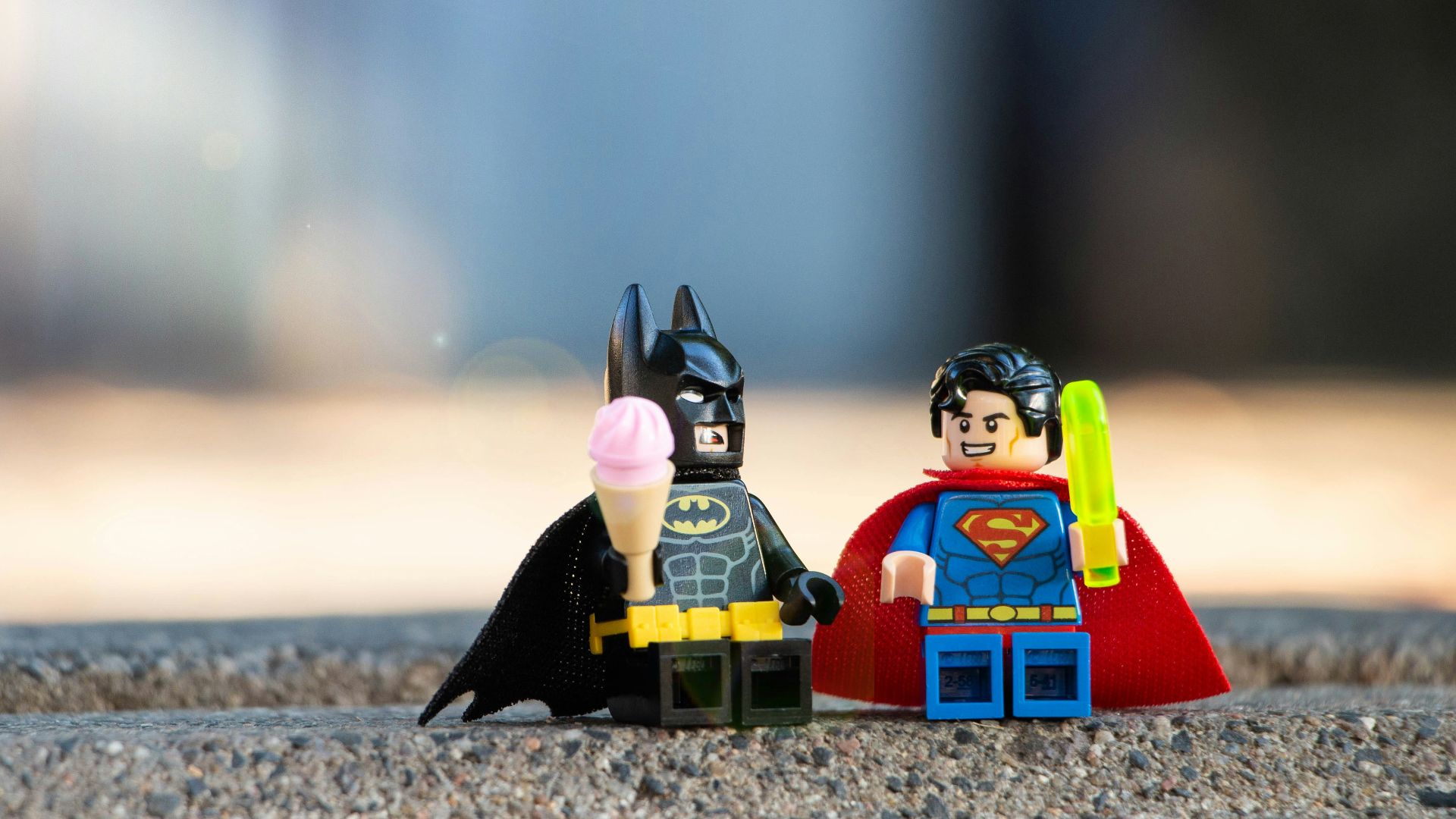 lego mini figure on brown sand