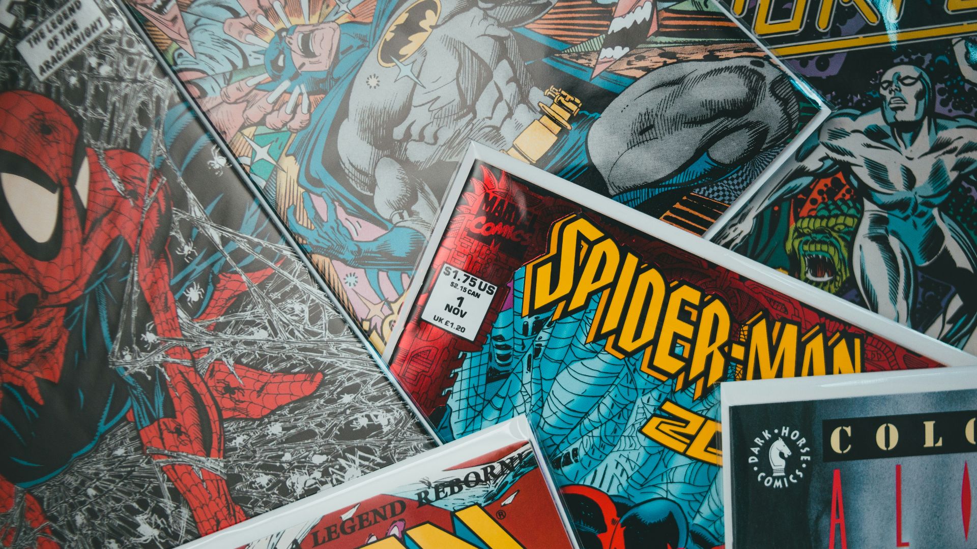 a pile of comics sitting next to each other