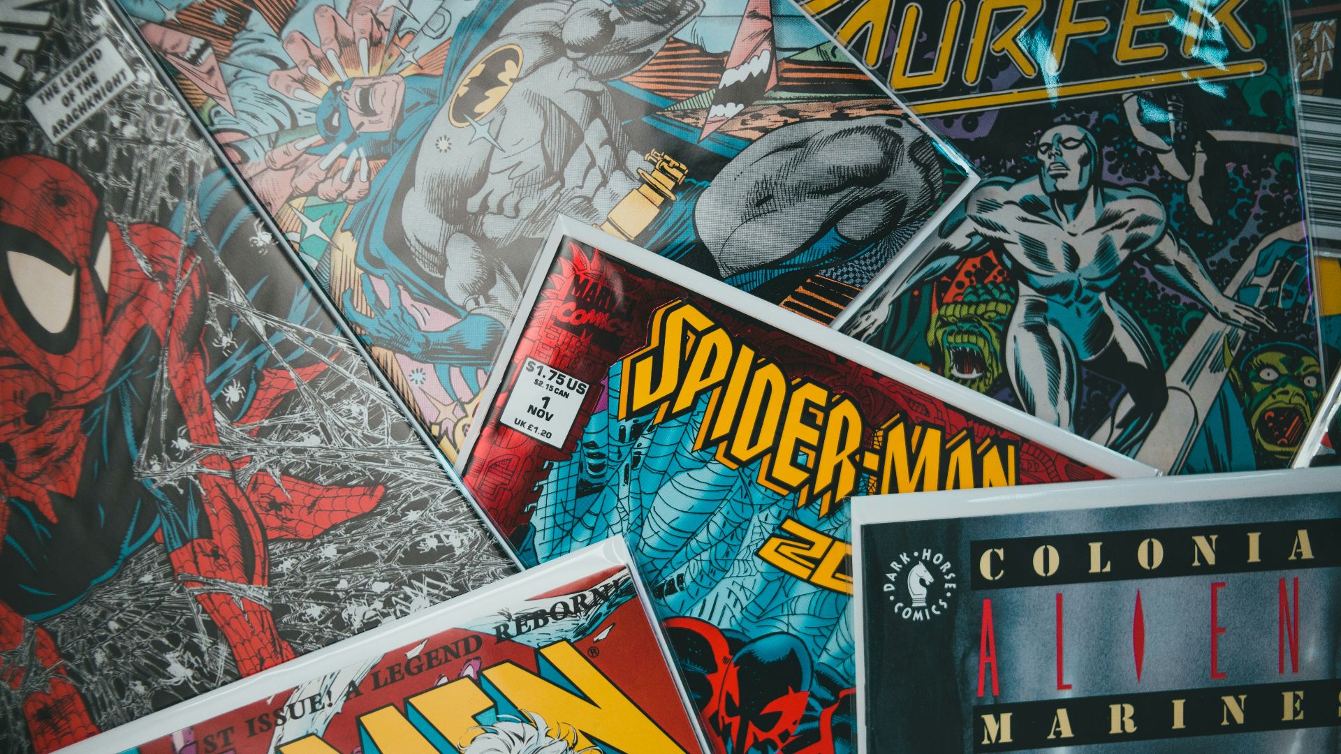 a pile of comics sitting next to each other