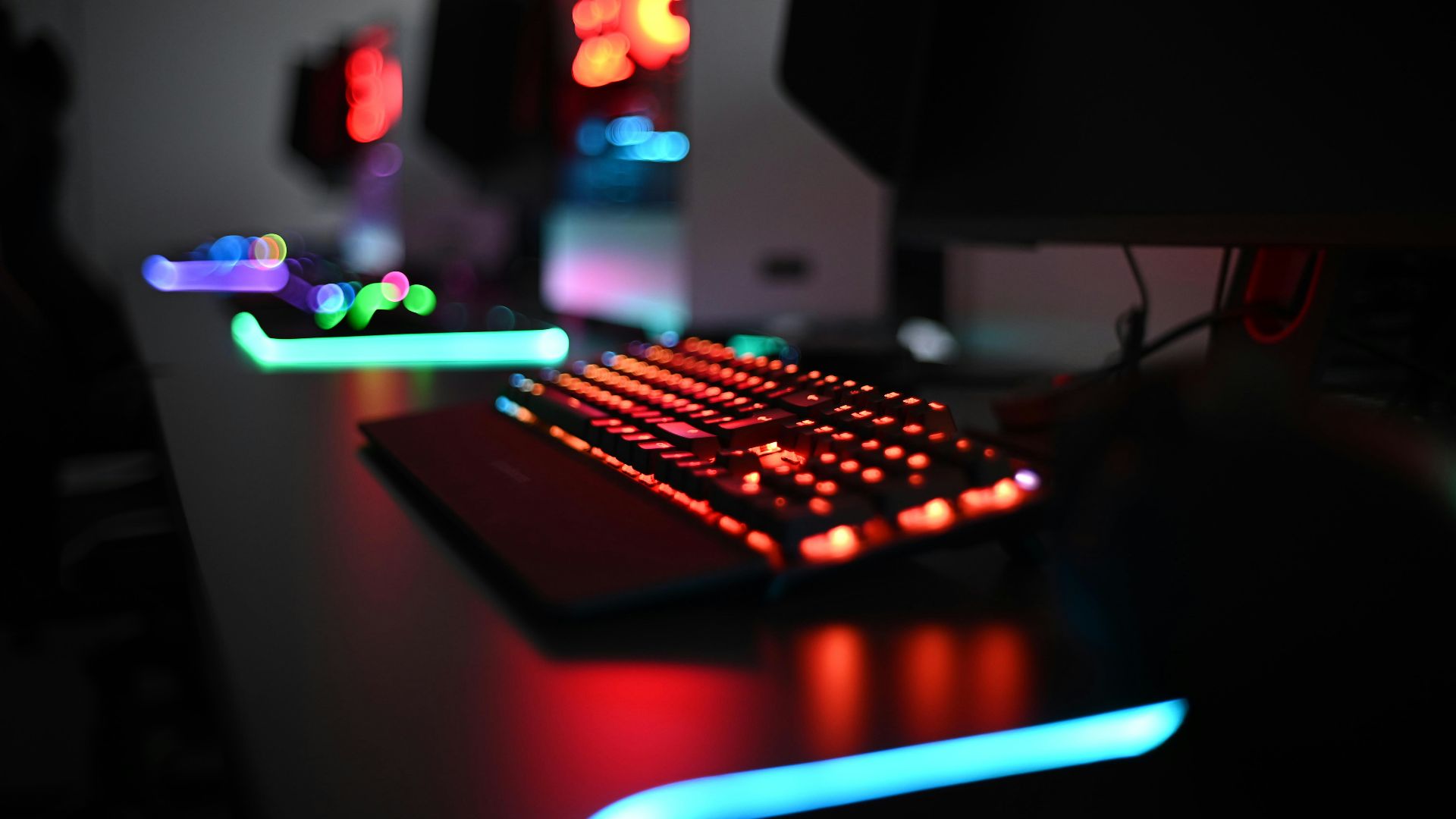 a computer keyboard sitting on top of a desk