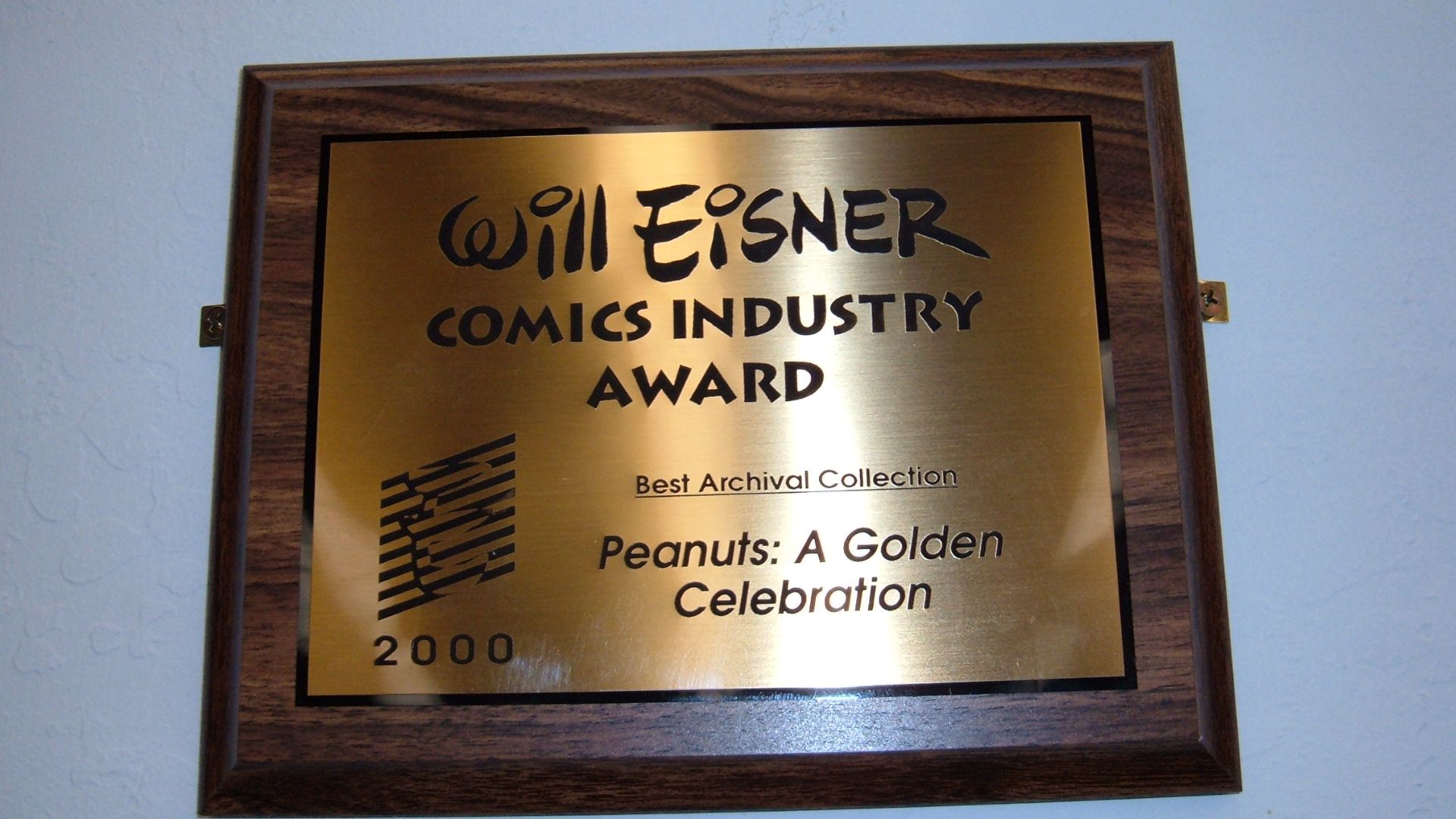 File:2000 Will Eisner Award for Peanuts - A Golden Celebration.JPG