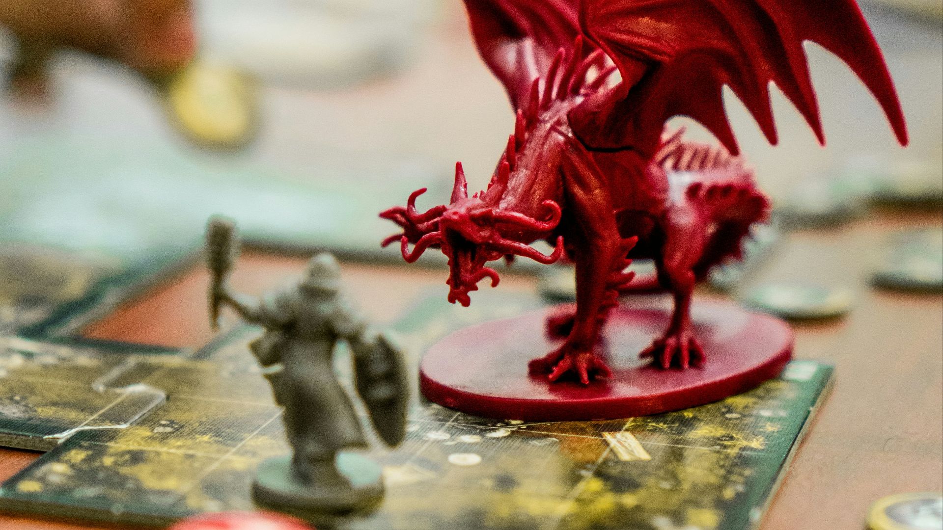 red dragon action figure on table