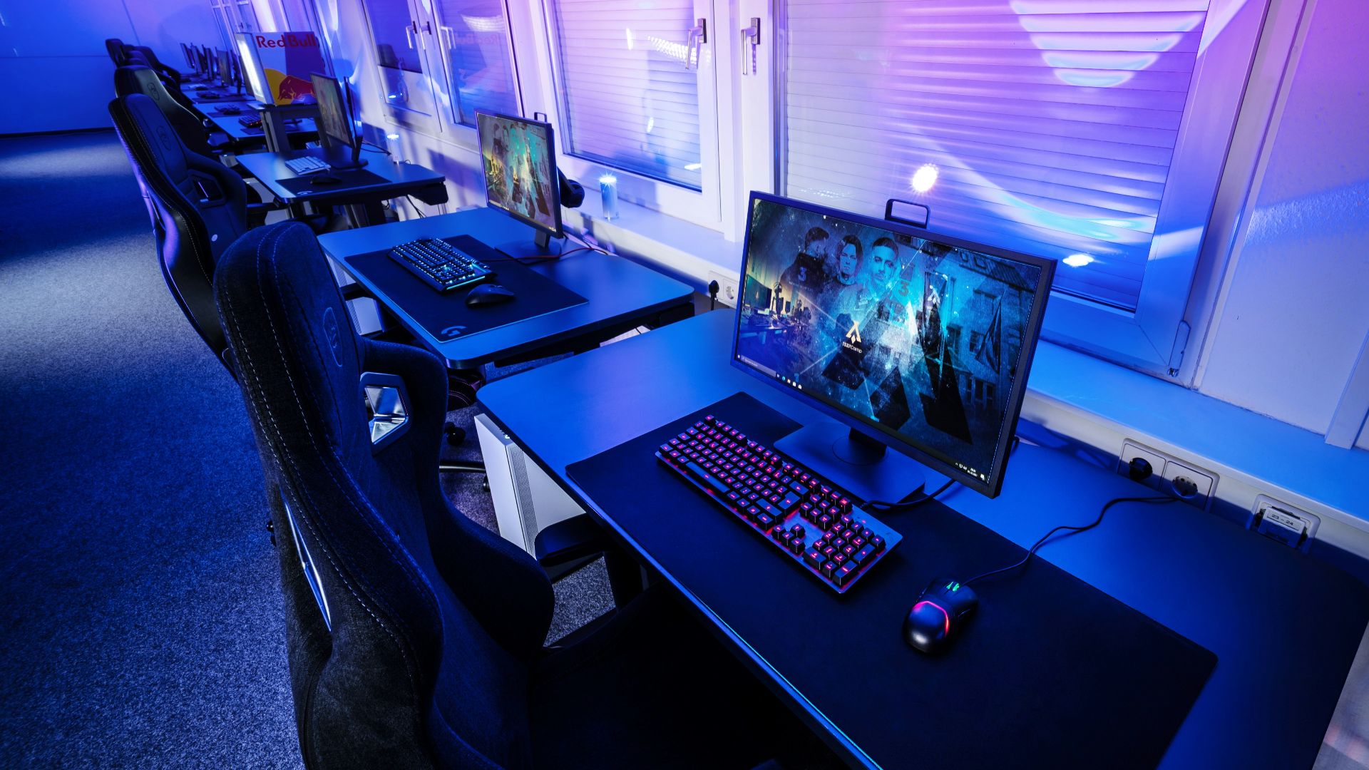 a computer desk with a monitor and keyboard on it