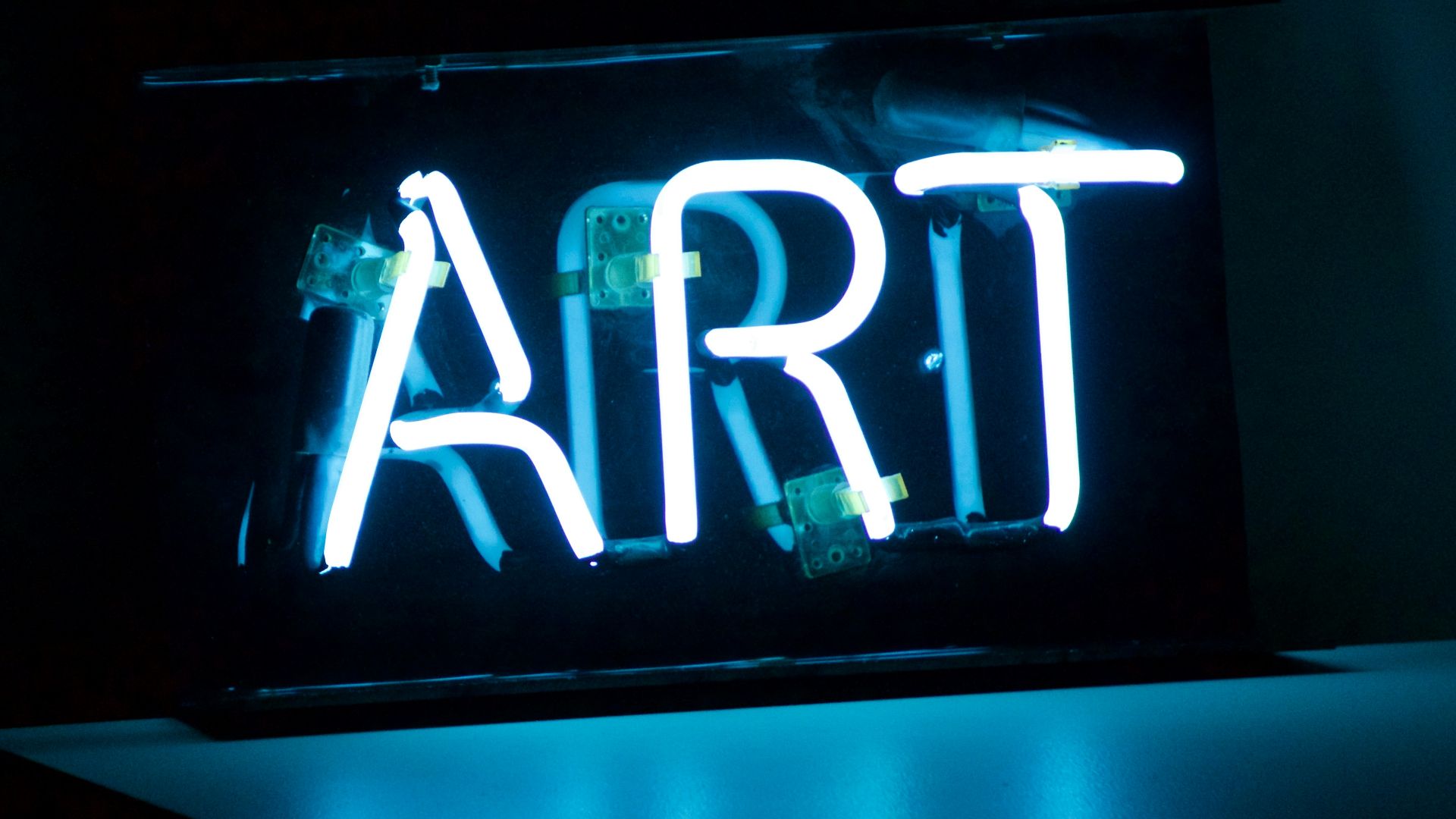 blue Art neon sign turned on