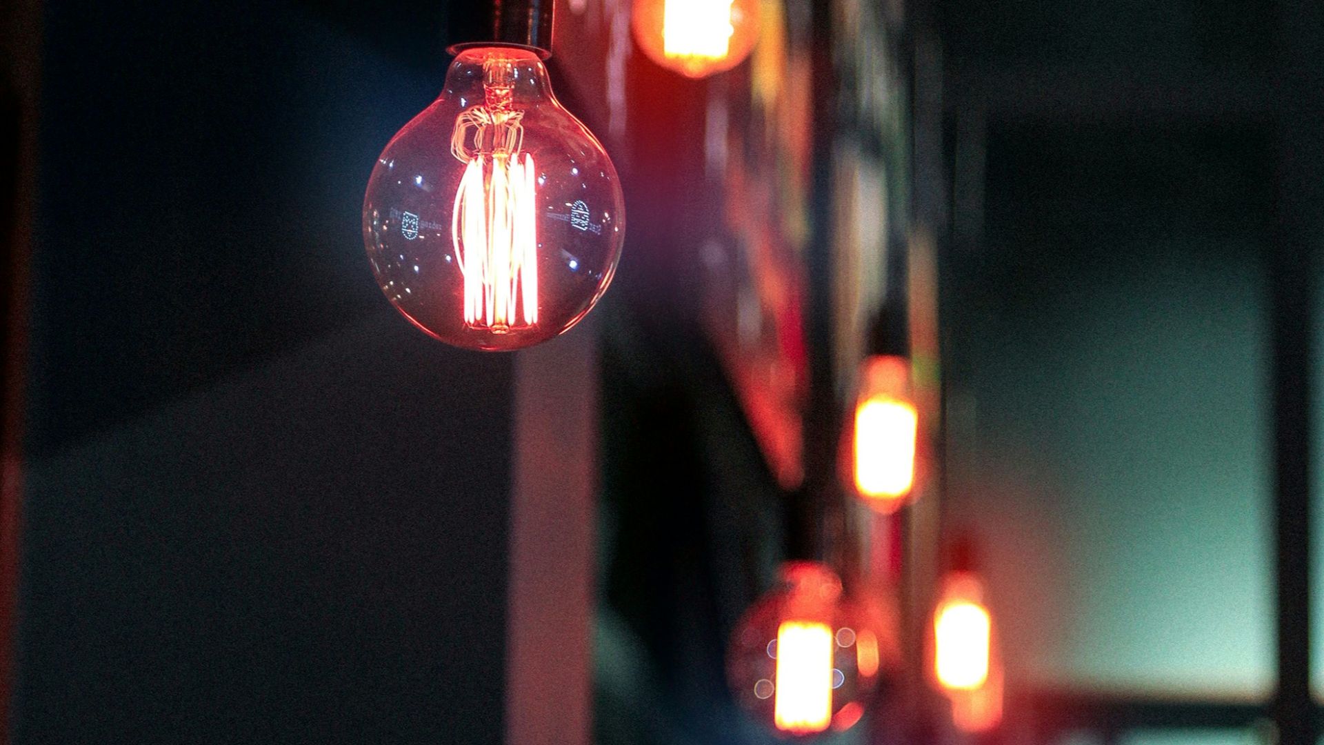 pendant LED light glowing near wall