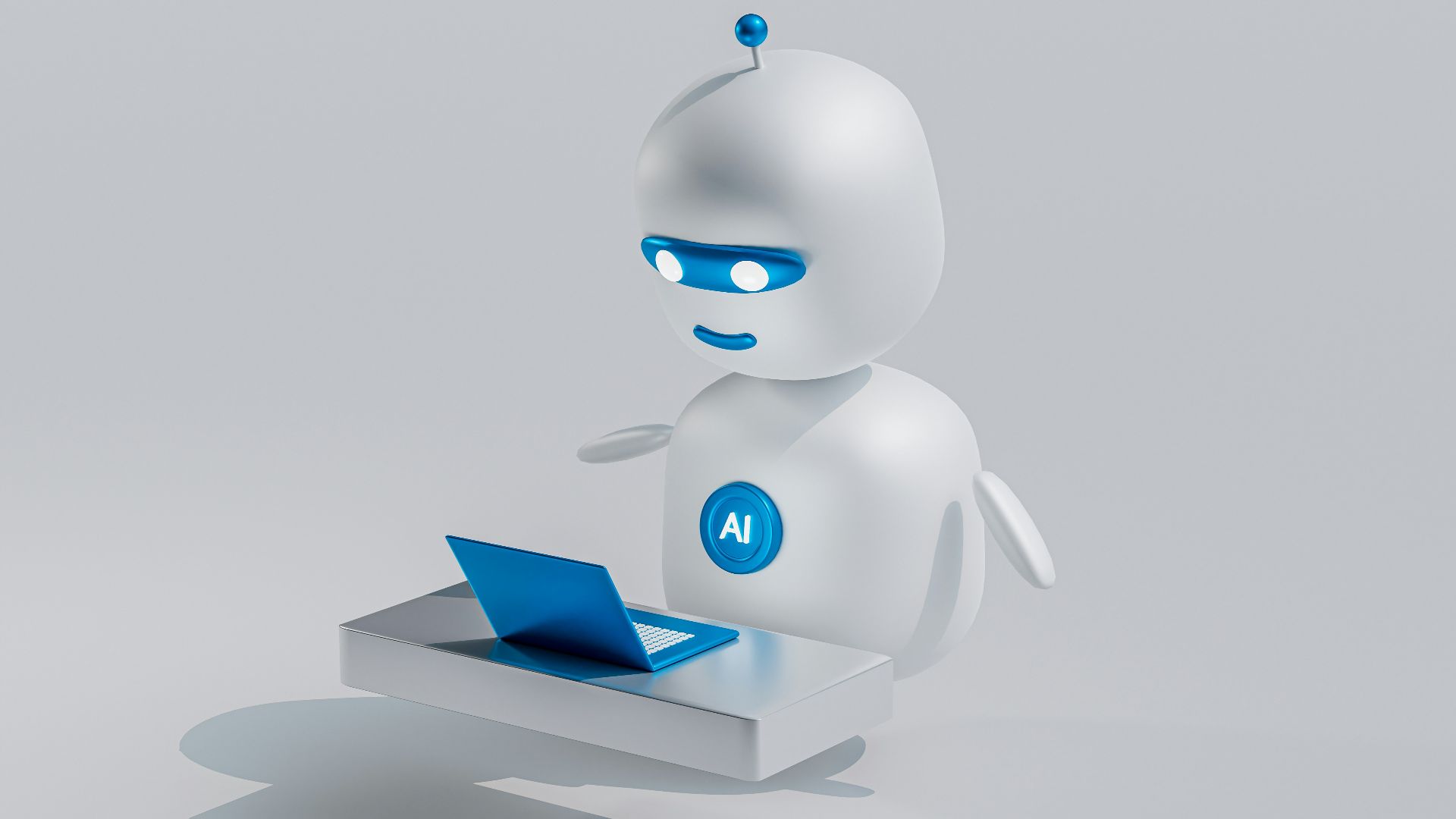a white robot with blue eyes and a laptop