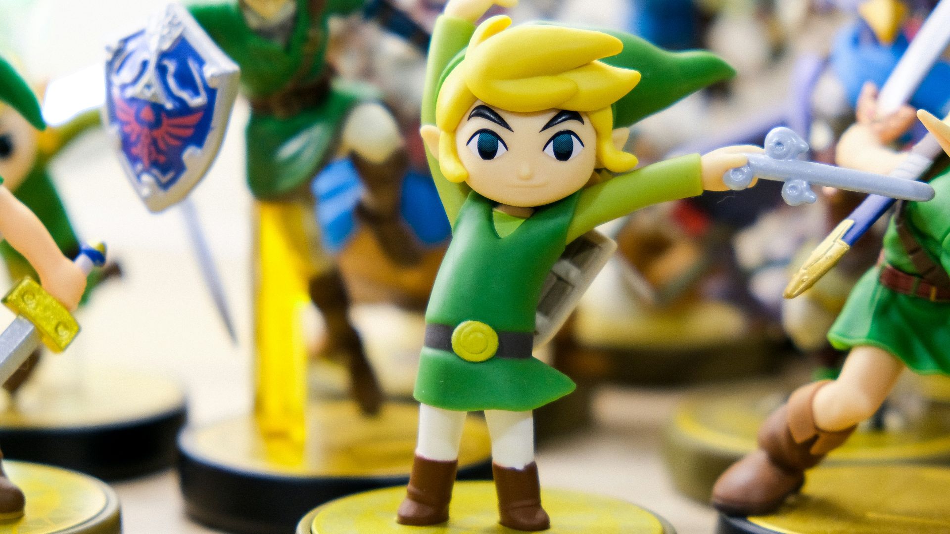 selective focus photography of Link vinyl figures