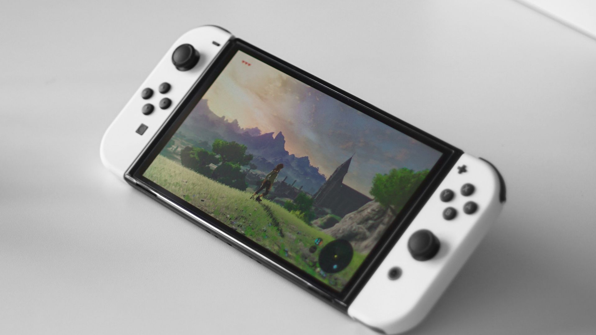 a nintendo wii game controller sitting on top of a table