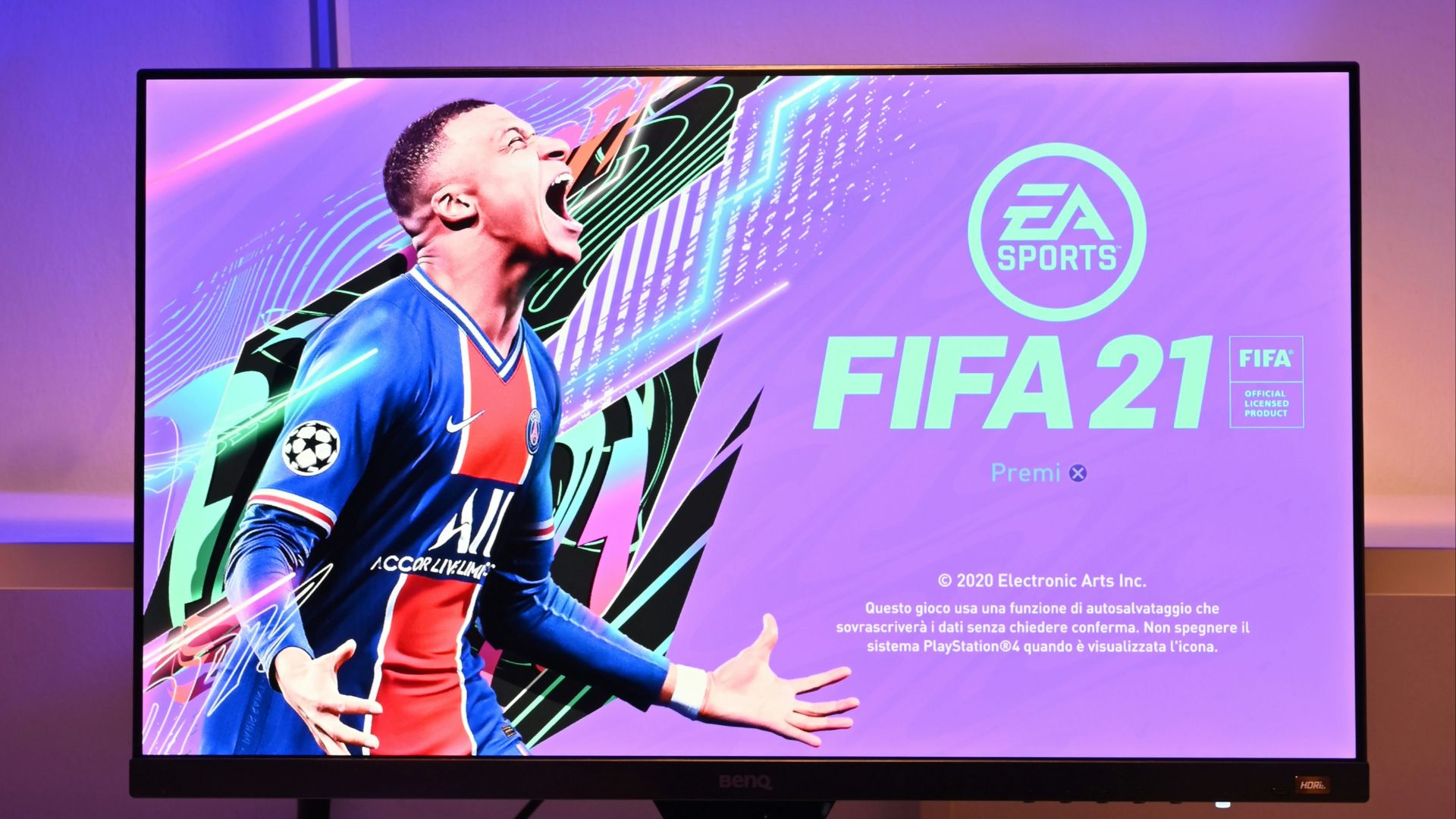 black flat screen tv turned on displaying man in blue and red jersey shirt