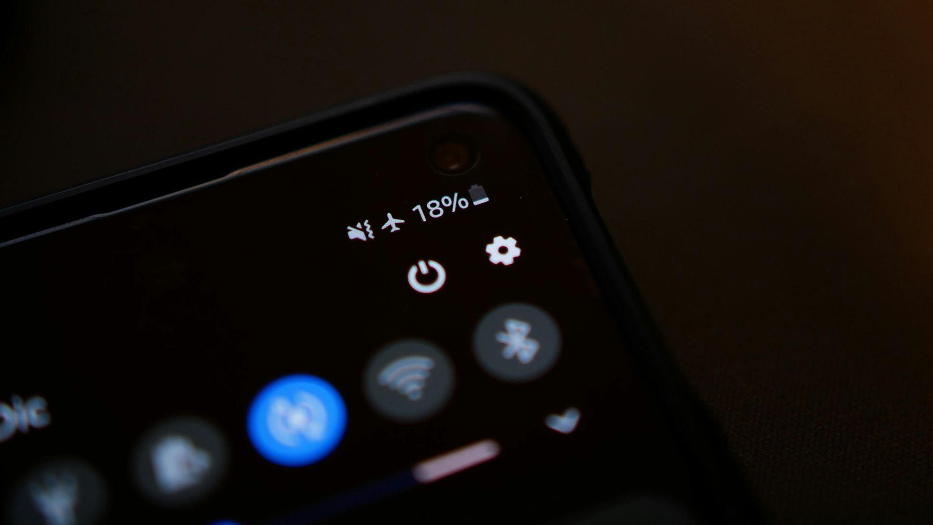 black remote control on white surface