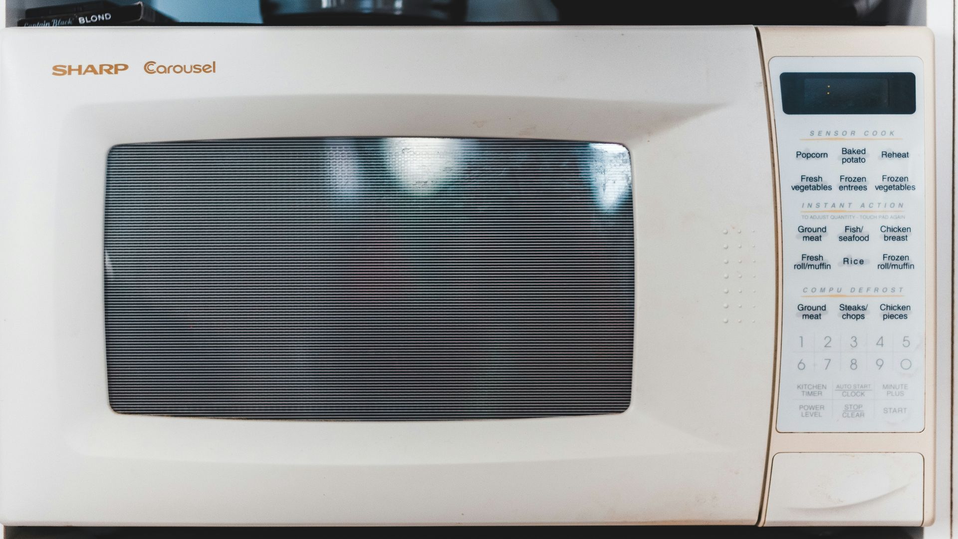 white microwave oven turned off