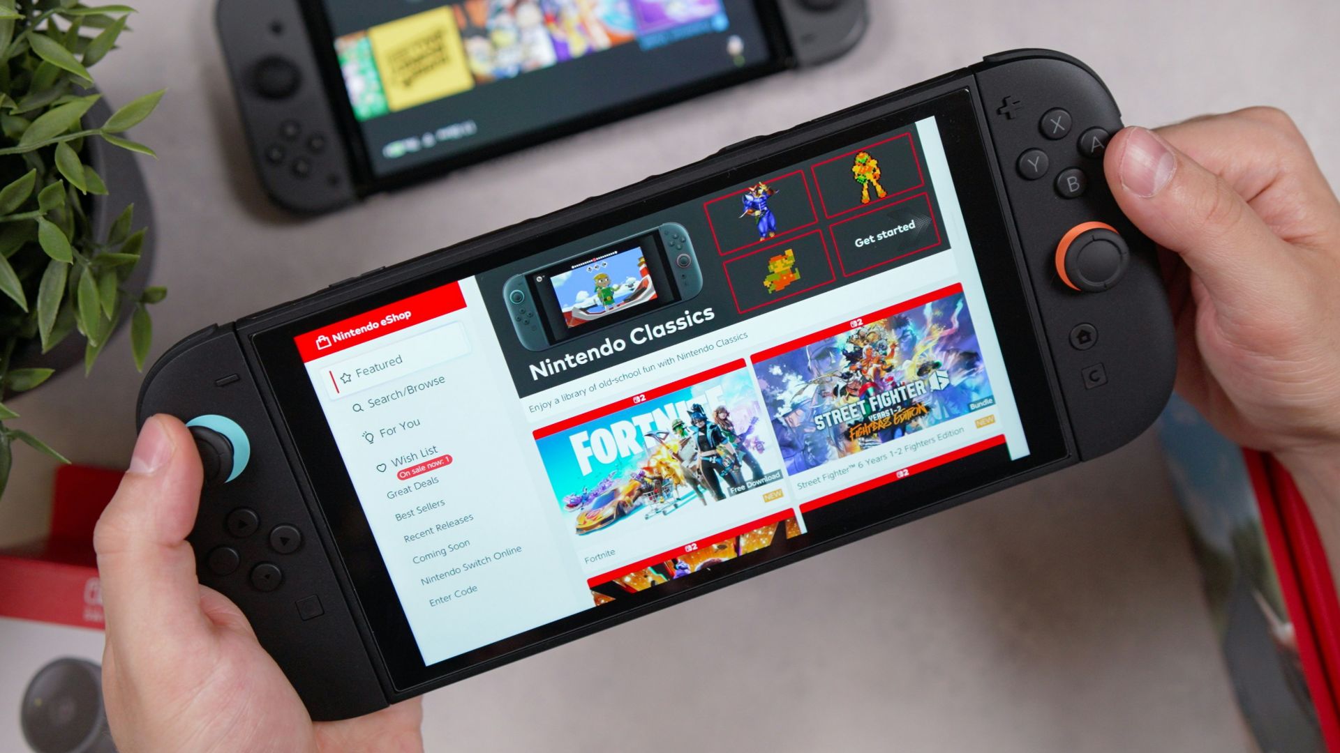 Someone is holding a handheld gaming console.