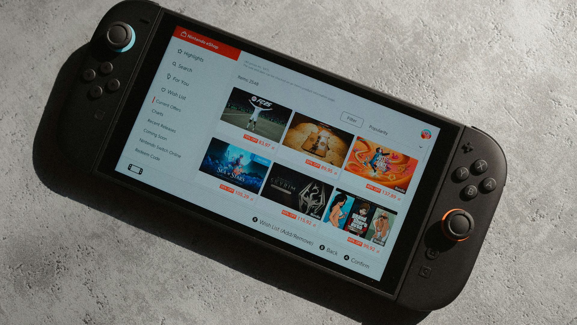 Handheld gaming console displaying a video streaming service.