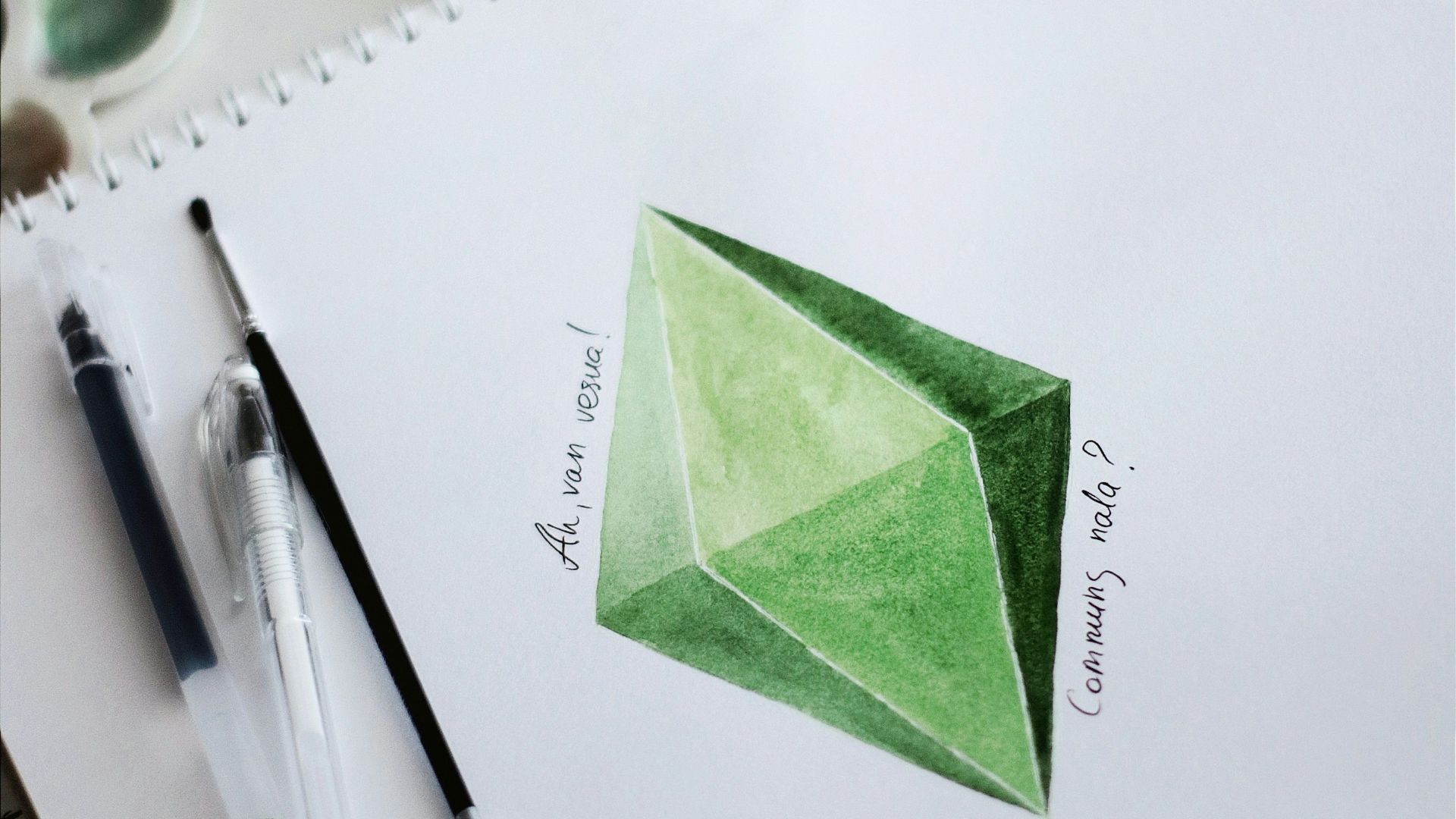 green sticky note on white paper