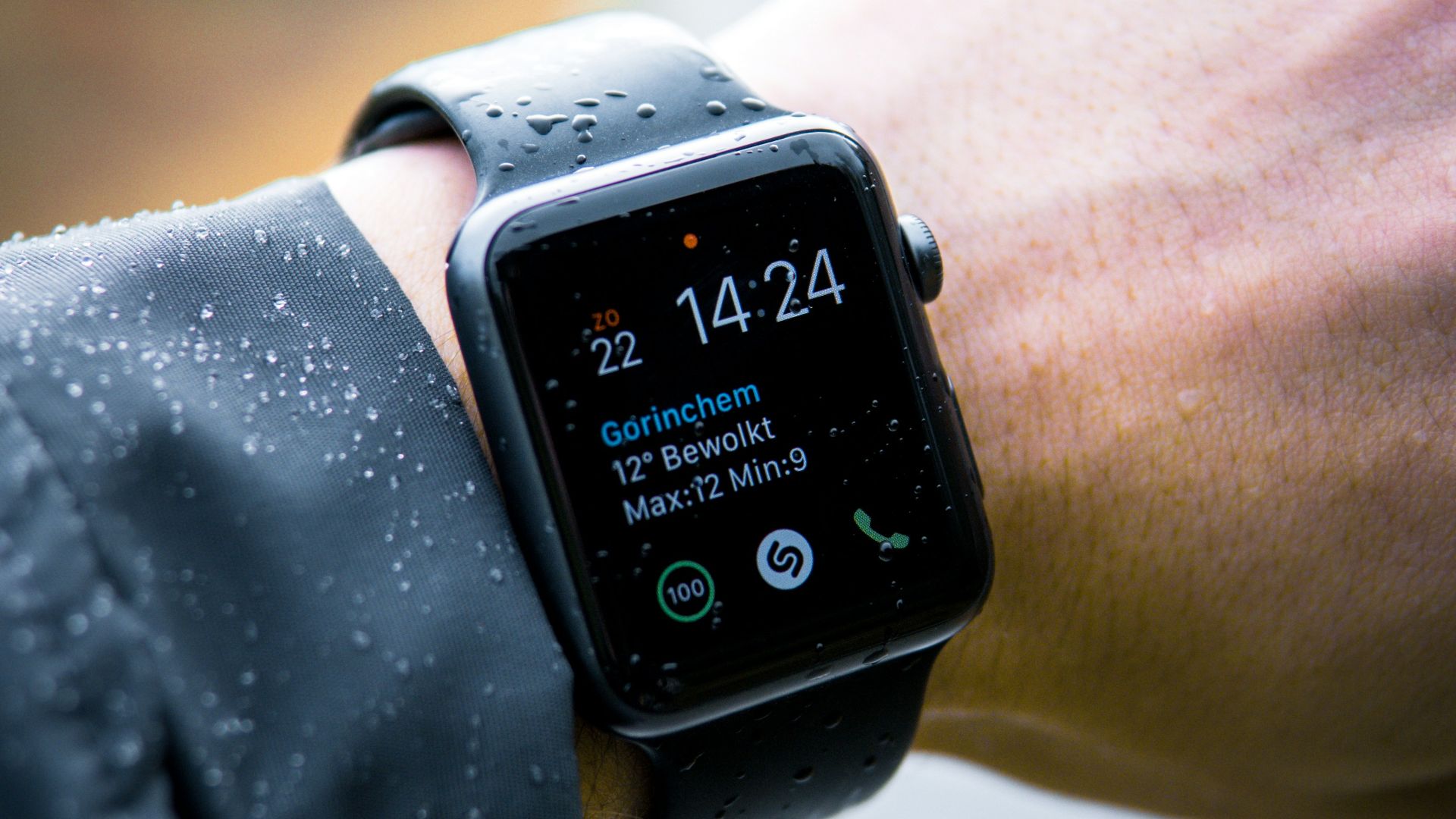 person wearing Apple Watch at 14:24