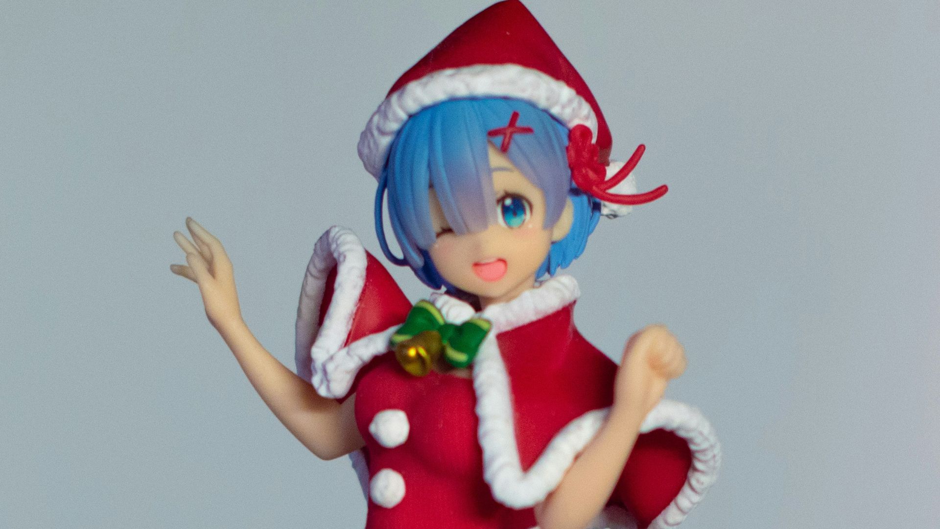 a figurine of a woman dressed as a christmas cheerleader